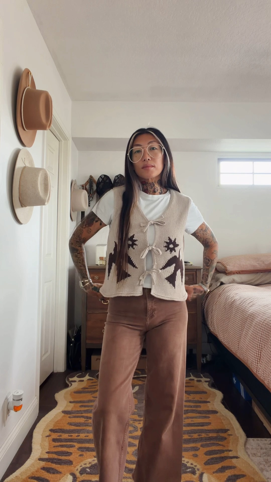 It’s Friday. Come on, let’s get dressed 🤎

Vest: Joni Bow Tie @pandco_women 
Bottoms: @zara 
Boots: no. 1001 fwy Chelsea furs @pskaufman 
Rings: @whitewolfsyndicate @americandecaychicago 
Cuff: @sage_silver 
Watch: the Jane @bredastudio 
Hat: Ezra @gigipip