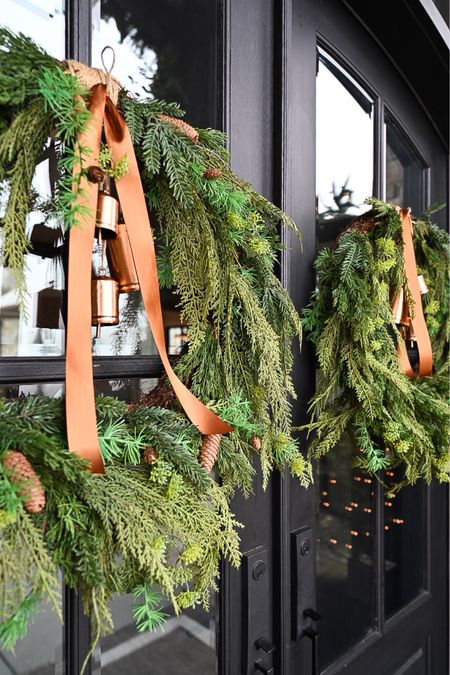 Adding these beautiful wreaths as the finishing touches to my holiday front porch!

Holiday  Holiday home  Holiday home decor  Christmas  Christmas wreath  Wreath  Ribbon  Bells  Christmas decor  Outdoor holiday decor  Front porch  Front door

#LTKhome #LTKHoliday #LTKSeasonal