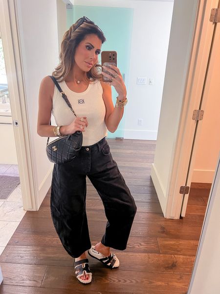 Wearing a size small in top and 25 in jeans. 

Spring fashion, summer fashion, black jeans, barrel jeans, free people jeans, Chanel bag, Steve Madden, Sherpa shoes, black sunglasses, Emily Ann Gemma 

#LTKstyletip
