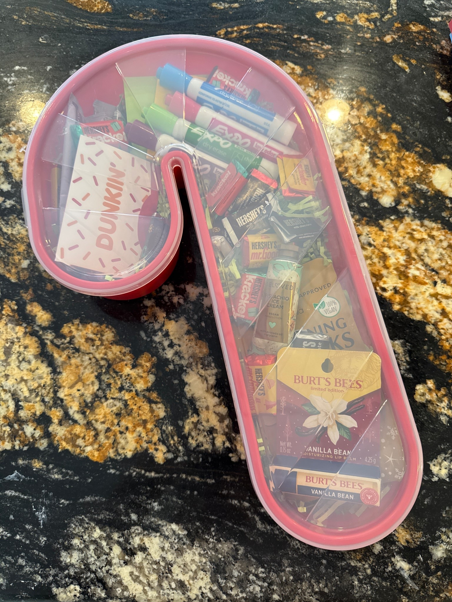 Another way to gift to Teachers! Stuff with whatever your child’s teacher likes. I added chocolates, expo markers, post-it notes, bloom drink mix, hand cream, chapstick, under eye mask, and a gift card. I added paper shreds to the bottom to lift. Such a fun way to gift! 

#LTKHoliday #LTKSeasonal #LTKGiftGuide