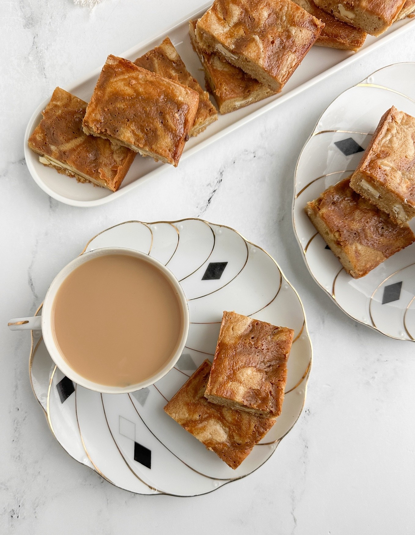 Vietnamese Coffee Swirl White Chocolate Blondies Chewy white chocolate blondies swirled with
Vietnamese coffee and sweetened condensed milk, finished with cardamom. The phin is optional but so
fun - and everything else you need is linked here. Full recipe at sherisilver.com

#LTKfoodie #LTKSeasonal #LTKHome