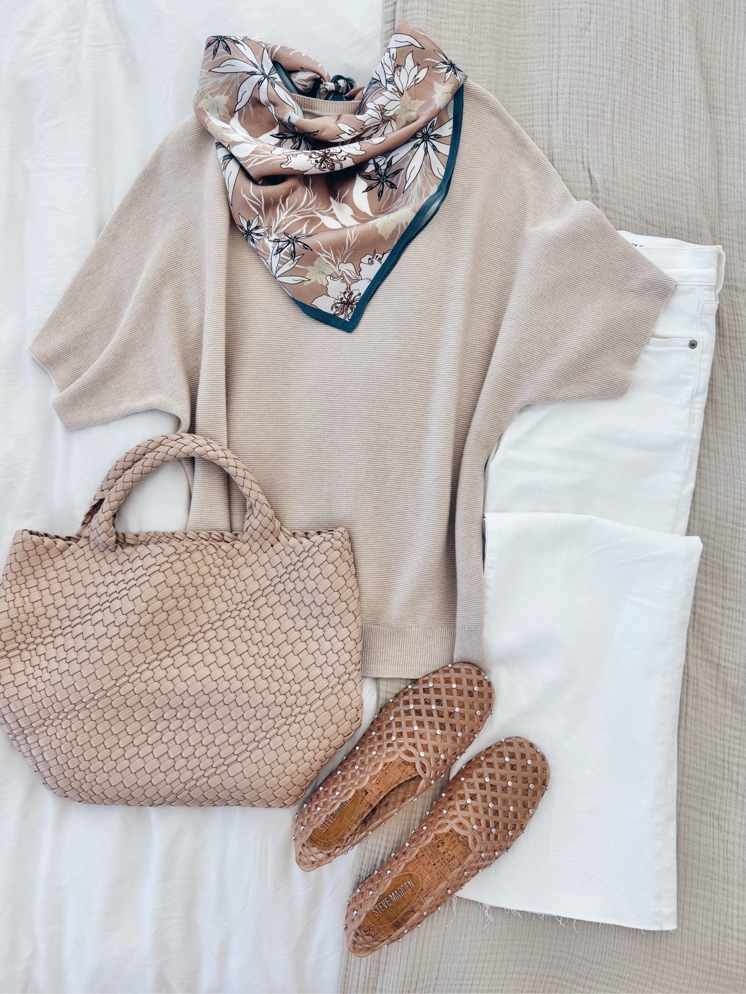 Spring outfit!  These jelly shoes are so comfortable.  True to size.  I have small in the top and 27 tall in the white jeans. I am 5’11”.  

#LTKTall #LTKootd #LTKSaleAlert