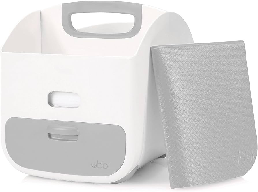 Ubbi Portable Diaper Changing Station Diaper Storage Caddy Organizer with Folding Changing Mat, S... | Amazon (US)
