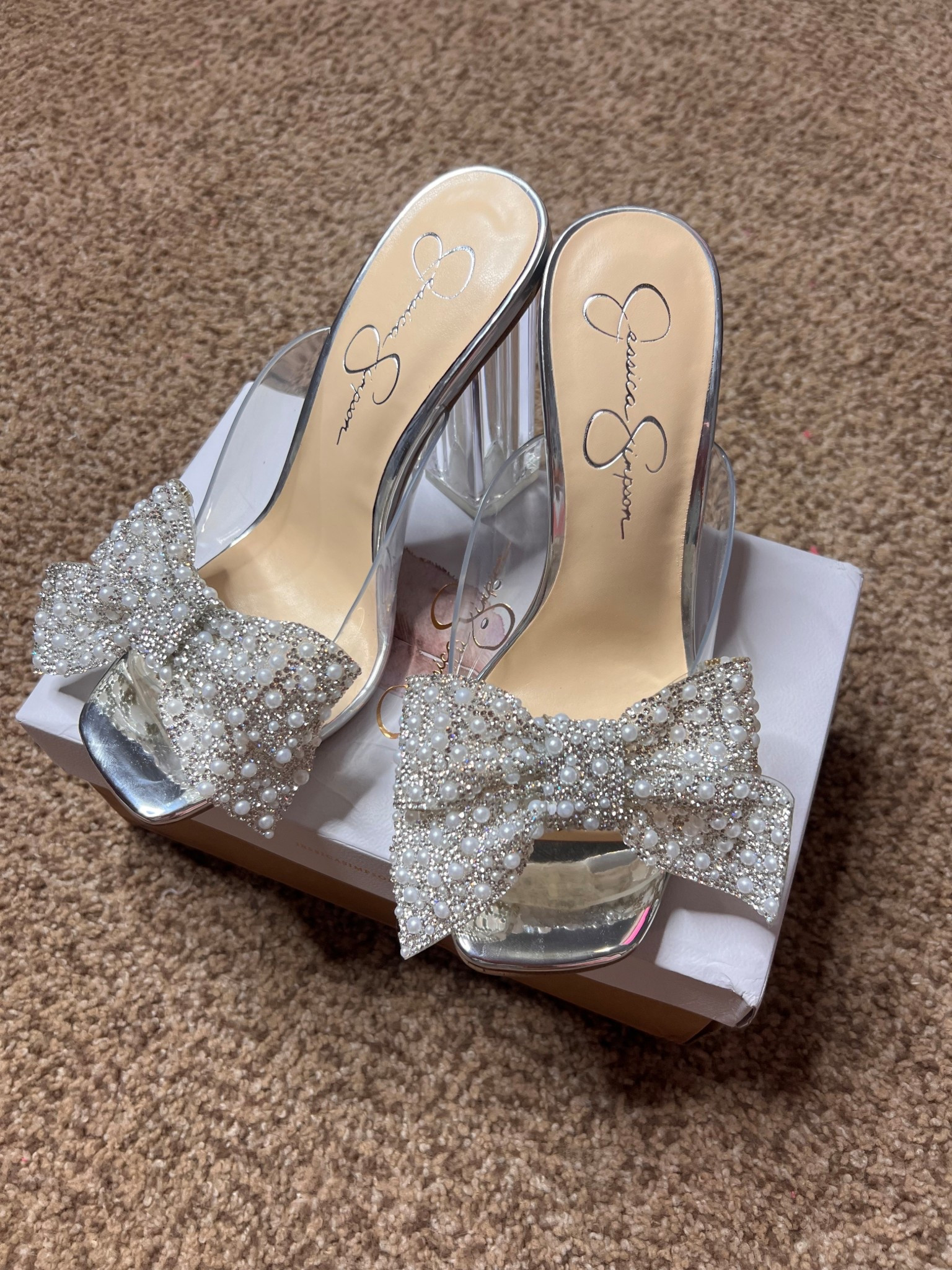 Yall look how beautiful these shoes are!! 😍😍😍 I got my true size 8. They do have a little cushion. 

Clear heels, bow heels, special event heels, special event shoes, Jessica Simpson heels, wedding guest shoes, wedding guest heels, pearl shoes, bow shoes, Alicia Bice, does it come in pink blog 

#LTKSaleAlert #LTKWedding #LTKFindsUnder100