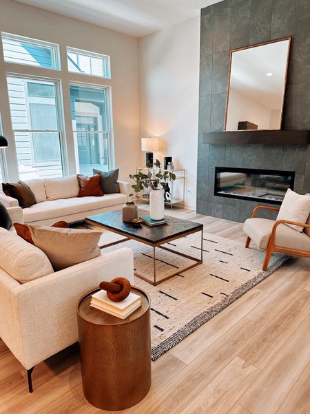 Loving this upscale family room with slate and cream colors to accentuate the cozy fireplace 

#LTKFind #LTKhome #LTKfamily