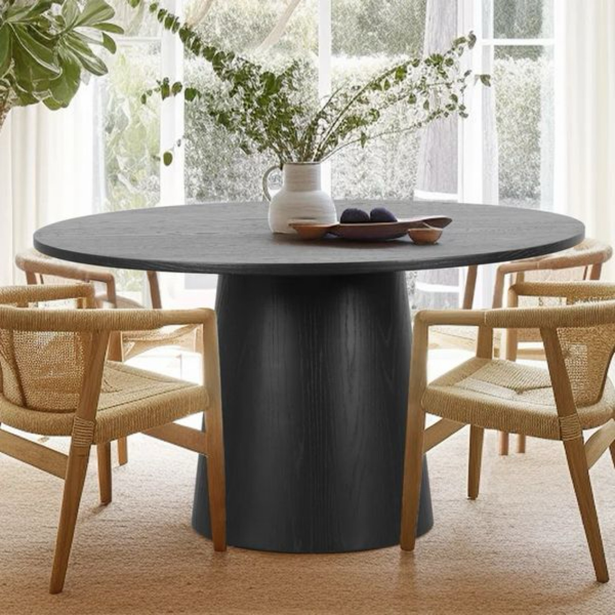 We chose this round dining table with wishbone chairs for @mountainthunderbreck and it turned out beautifully 🖤 #diningtable #roundtable #diningroom #kitchen #home #design #interiordesign 

#LTKHome