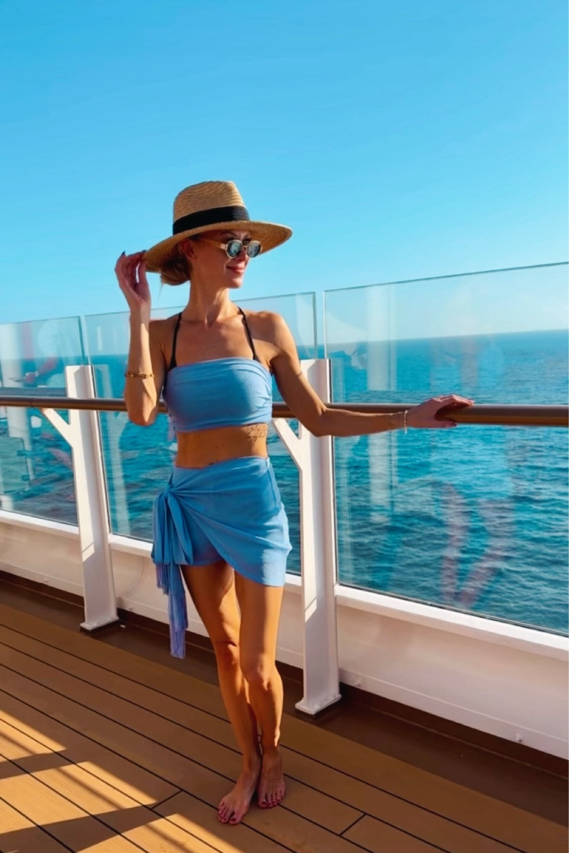 Light blue swim short and top set / hat / sunglasses 

#LTKSeasonal #LTKStyleTip #LTKSwim