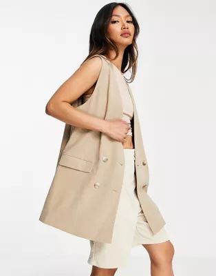 Mango - Blazer habillé d'ensemble sans manches à double boutonnage style veston de costume - Ca... | ASOS (Global)