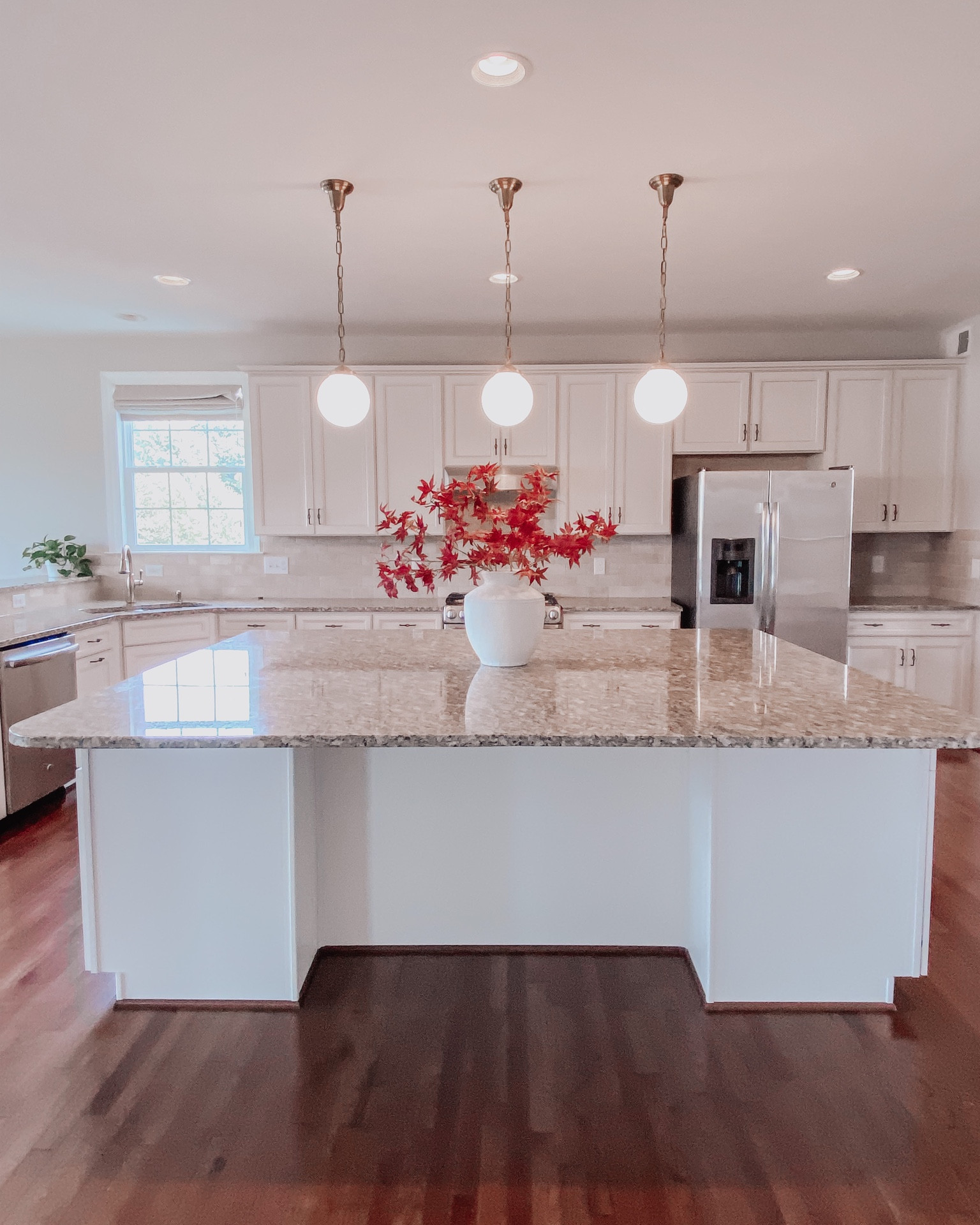 Fall decor: realistic maple leaf branches in an oversized stoneware vase.

#LTKSeasonal #LTKunder50 #LTKhome