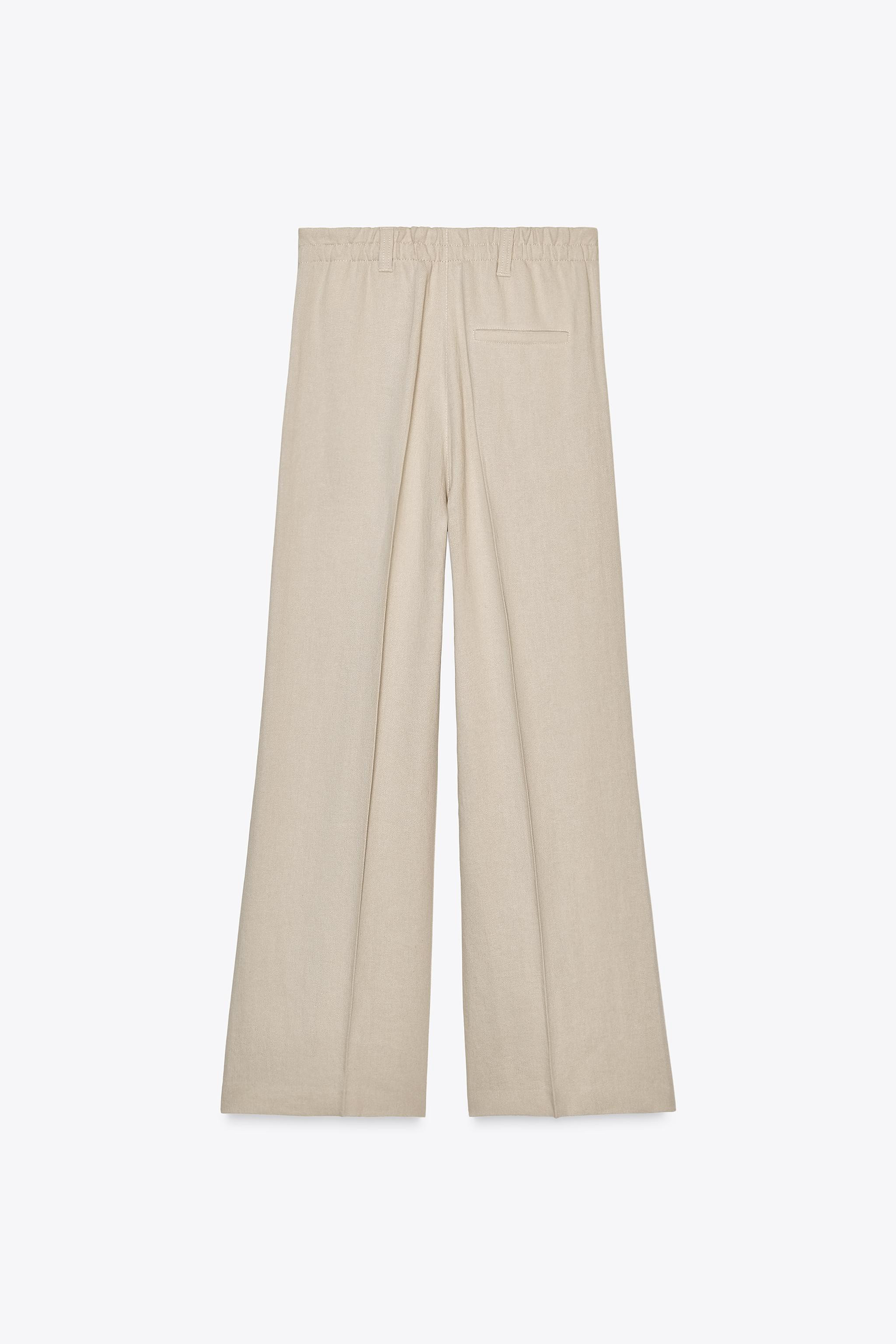 ZARA WOMAN COLLECTIONPantaloni a vita media realizzati in filato misto lino e viscosa. Cintura co... | Zara IT
