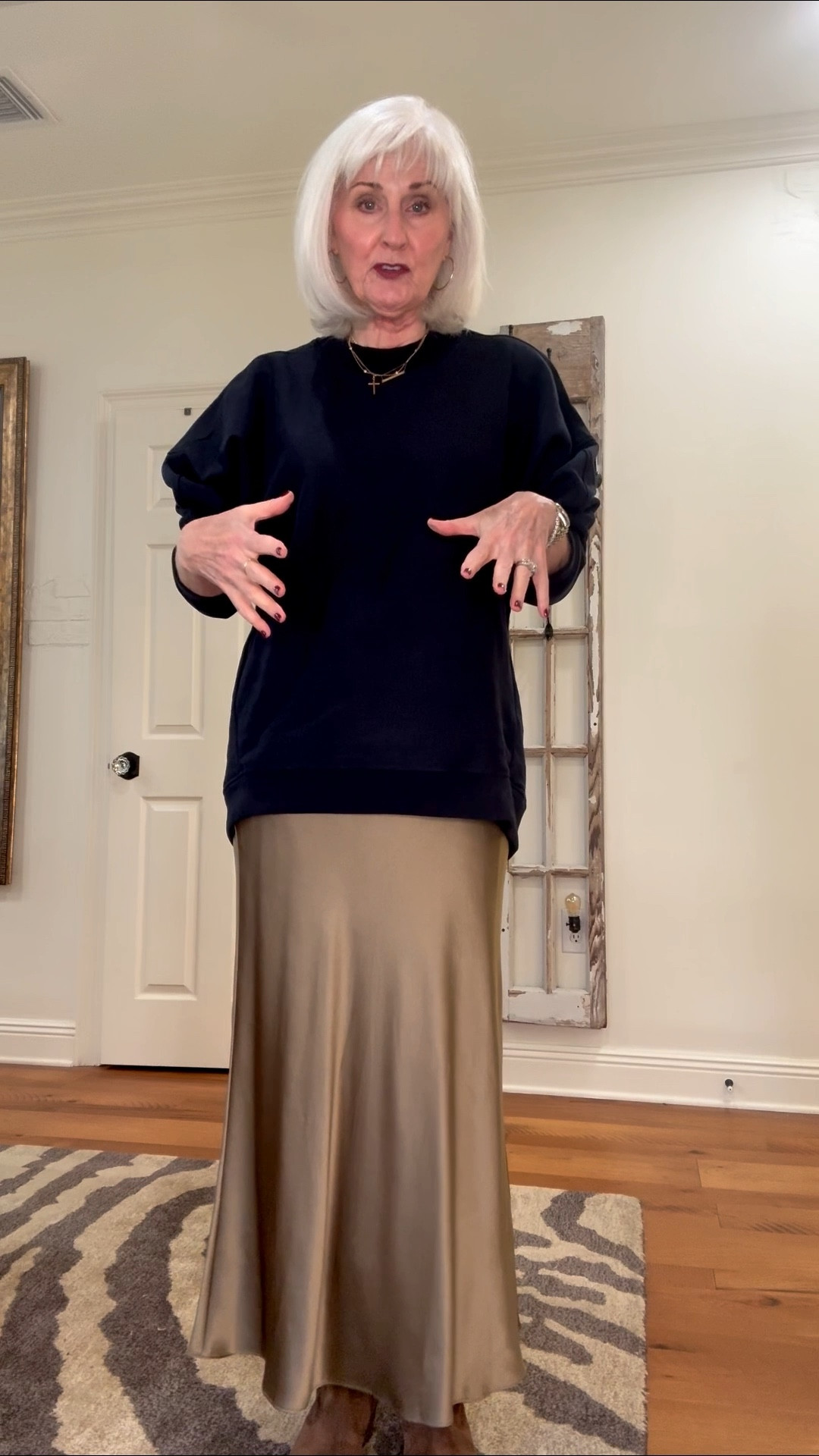 I love the juxtaposition of a silk skirt and a sweatshirt! This comfortable combo is great for church, lunch, office.  
@tibi

#LTKootd #LTKOver40 #LTKFindsUnder100