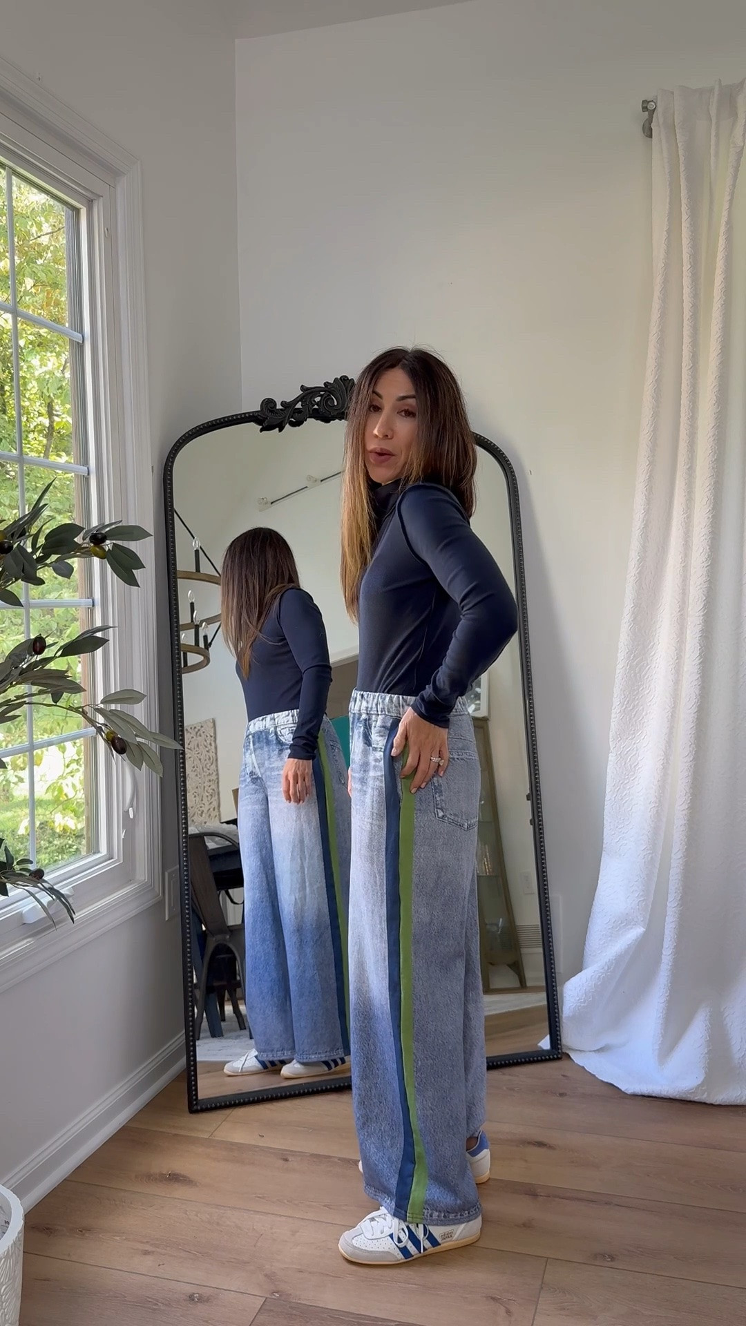 Small track jeans. Small turtleneck. Sweatpants jeans.