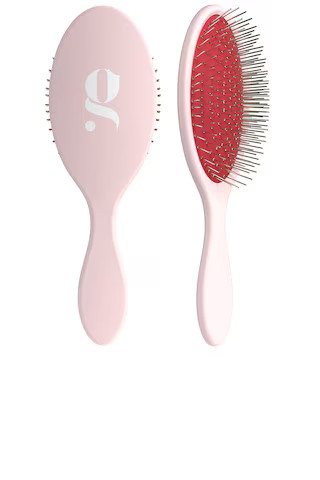 The Detangling Brush
                    
                    Glow Beauty | Revolve Clothing (Global)
