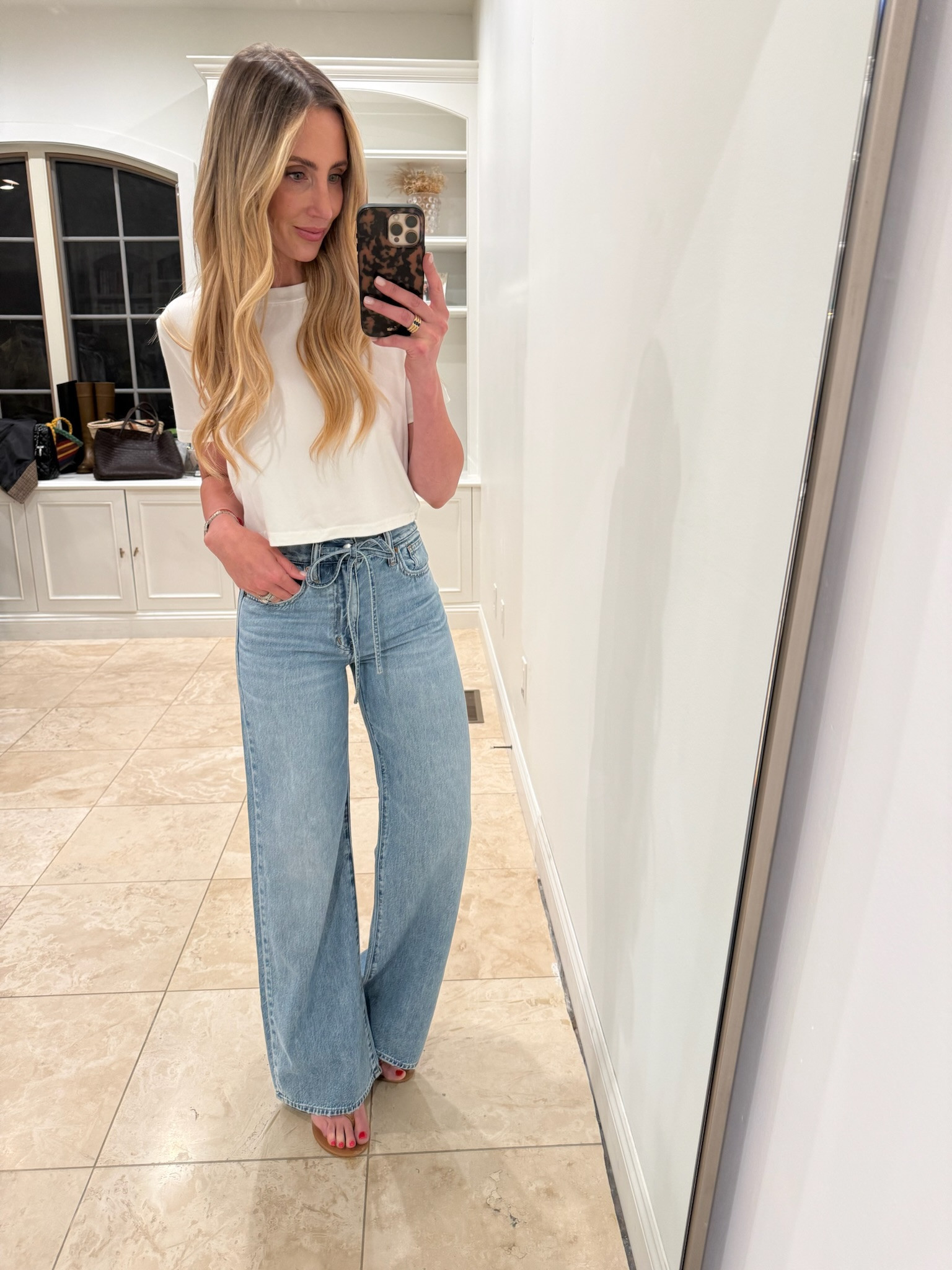 These tie waist jeans are everything! 

I am wearing a size 25 in the jeans and a size small in the shirt!