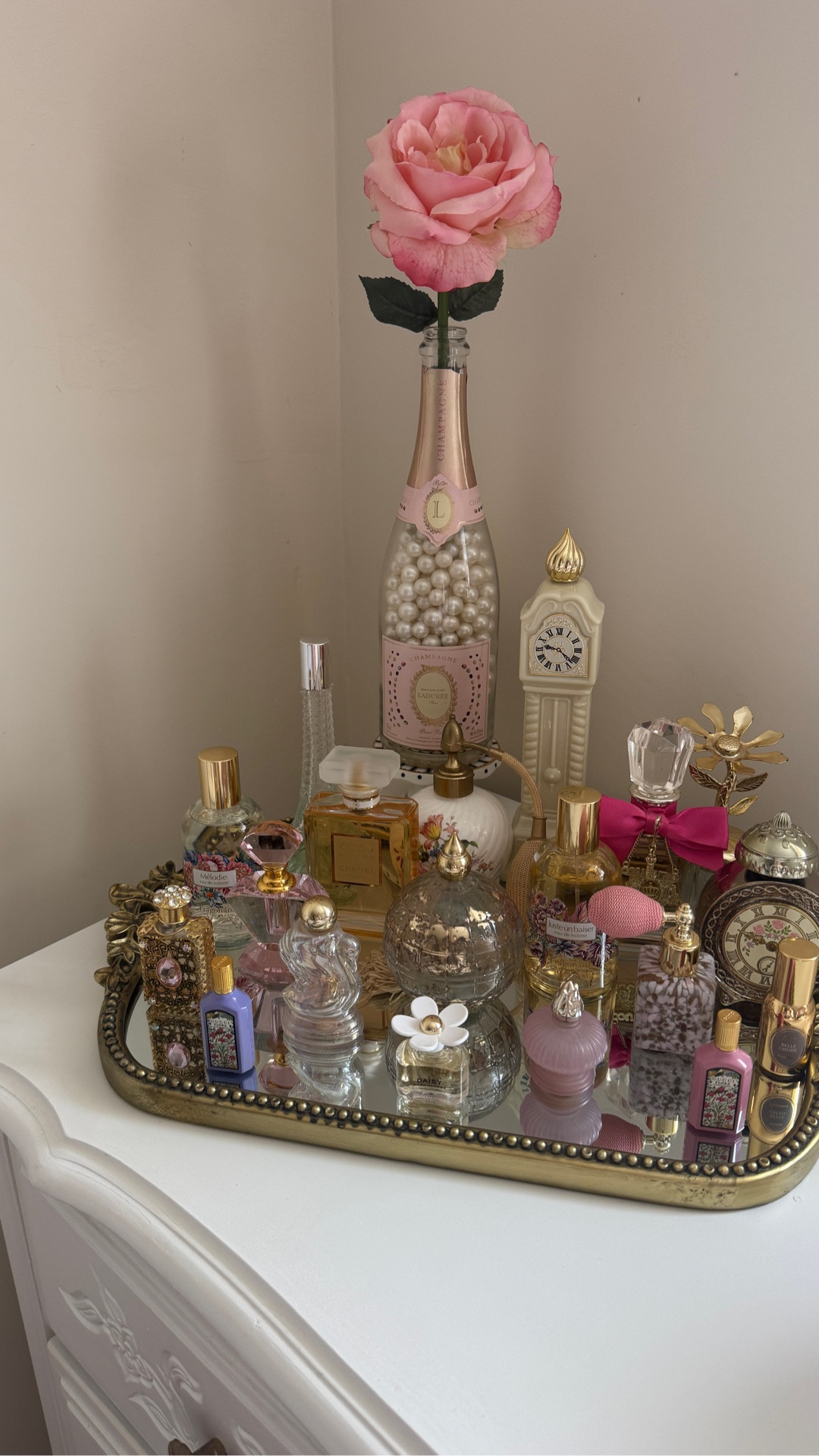 Setting up my perfume tray on my vanity. Gleaming Primrose mirror tray Anthropologie. Beauty. Home decor. 

#LTKHome