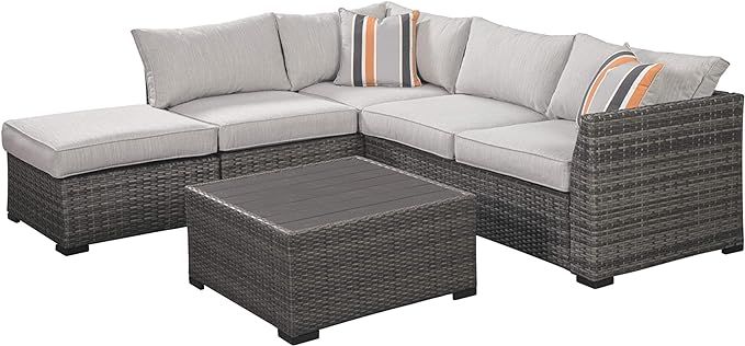 Signature Design by Ashley Outdoor Cherry Point 4 Piece Seating Set with Ottoman & Cocktail Table... | Amazon (US)