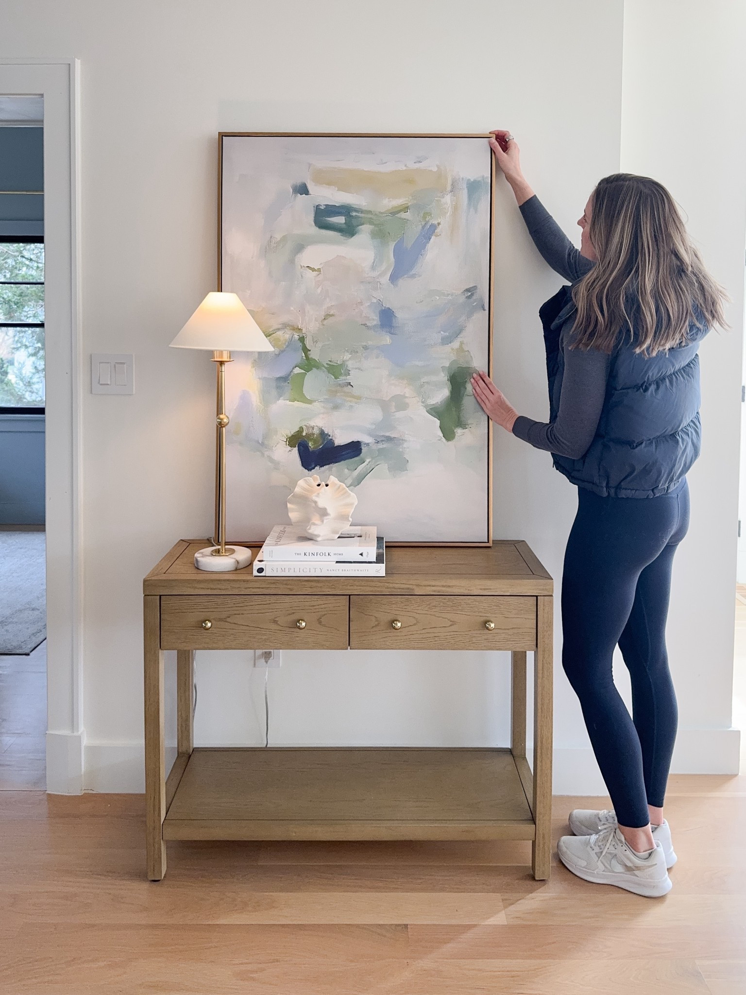 New console table, art, lamp, and textures vase to refresh this small empty wall. 
The console table is the light oak color 

#LTKHome #LTKSaleAlert #LTKOver40