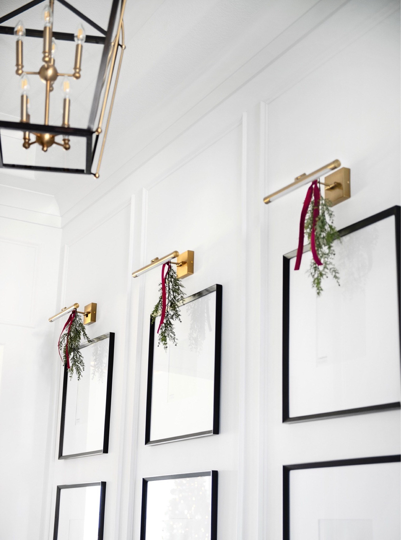 Christmas decor, holiday decor, gallery wall, picture frames, wall art, crate and barrel, Amazon home, Amazon Finds, picture light, gold fixture, gold lighting, entryway, entry light, birdcage, modern lighting, red velvet ribbon, Christmas ribbon

#LTKSeasonal #LTKHoliday #LTKhome