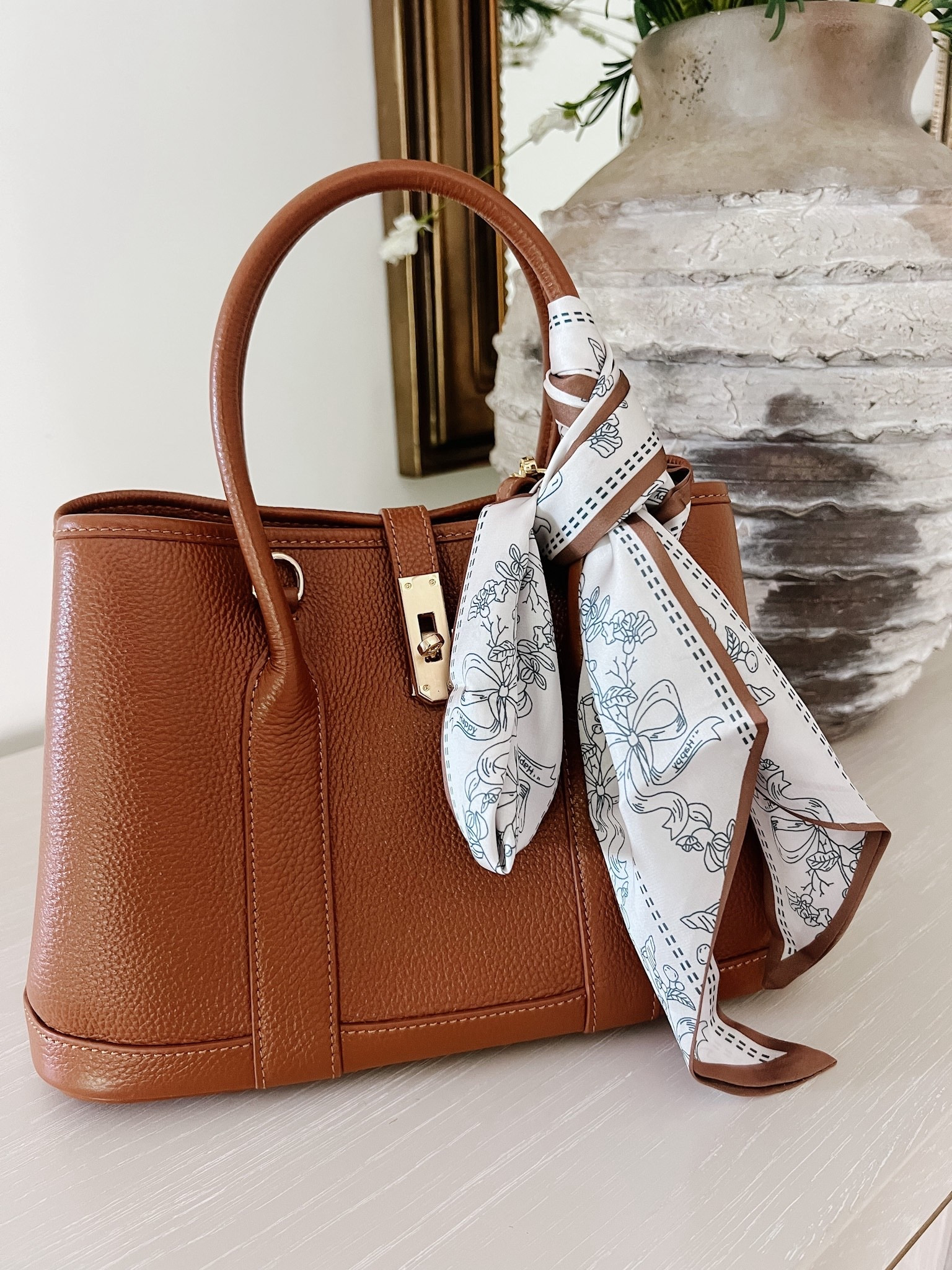 I’ve been loving this scarf from Amazon. It looks so great tied to your bag! 

#LTKFindsUnder50 #LTKStyleTip #LTKOver40