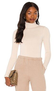 RE ONA Turtleneck Long Sleeve Crop Top in Ivory from Revolve.com | Revolve Clothing (Global)