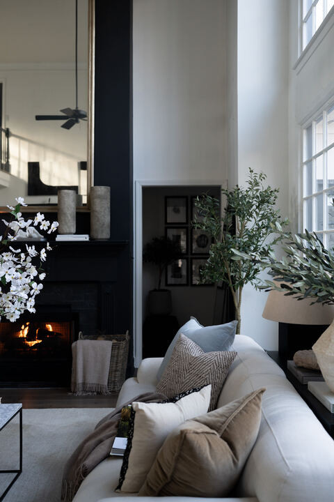 I cannot stop staring at this living room. The creamy sofa, warm wood tones, and soft textiles create such a serene foundation, and those subtle blue accents make everything feel fresh and intentional. I love how the space feels collected and layered without being busy. OMG it is giving quiet luxury, comfort, and classic design all at once. EEK I would happily curl up here every single day. 

 #LTKSpringSale #LTKSeasonal #LTKHome