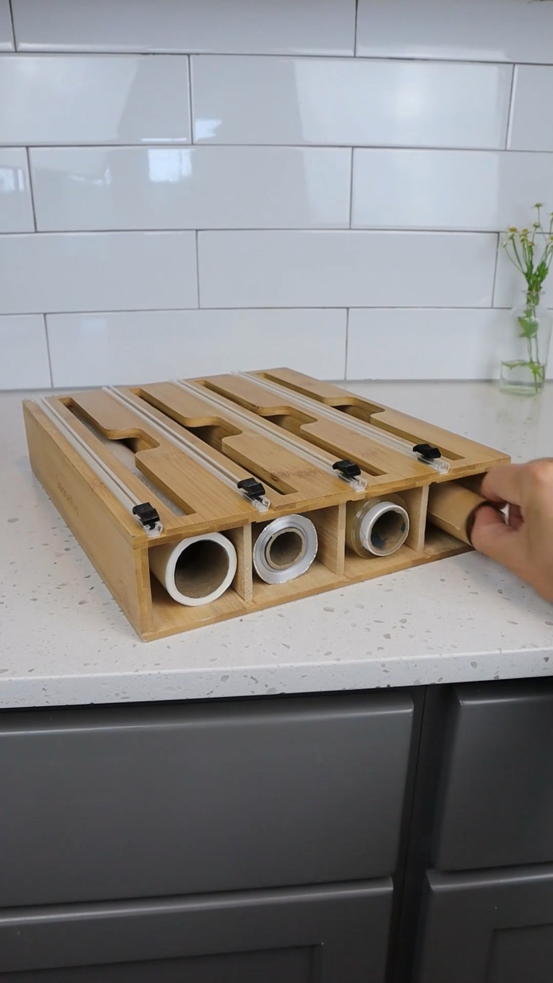 Sale Alert! 40% off this kitchen organizer that holds up to four rolls of wraps at a time. You can put in saran wrap, aluminum foil, or any other type of roll you’d like! 

#LTKsalealert #LTKunder100 #LTKhome