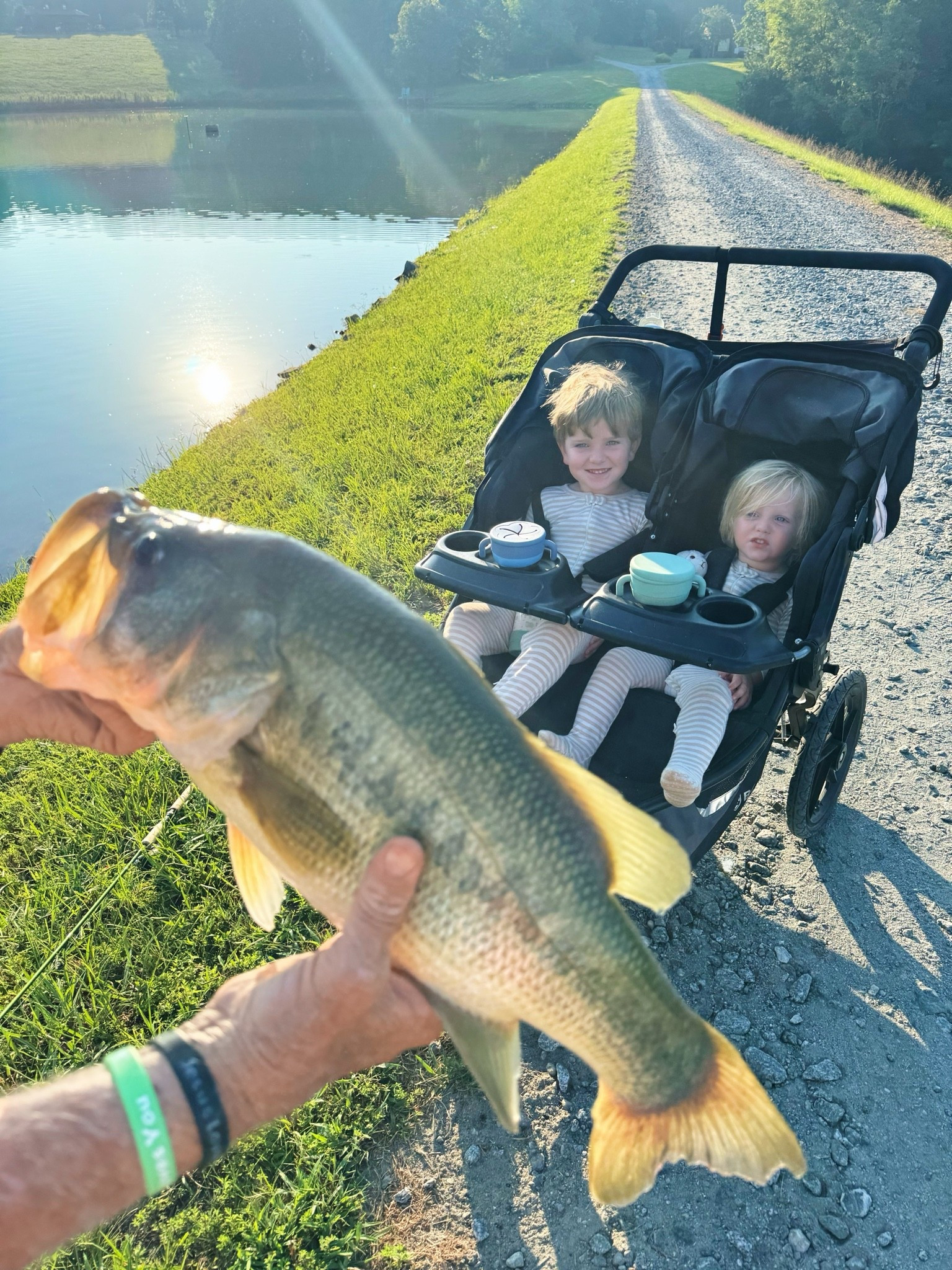 And as we were walking back, lookie what Mr. Roger had caught in the pond!! 🎣 What a catch!!! 🐟 The boys thought this was the coolest thing ever and have not (!!) stopped talking about it since!! 🤭
