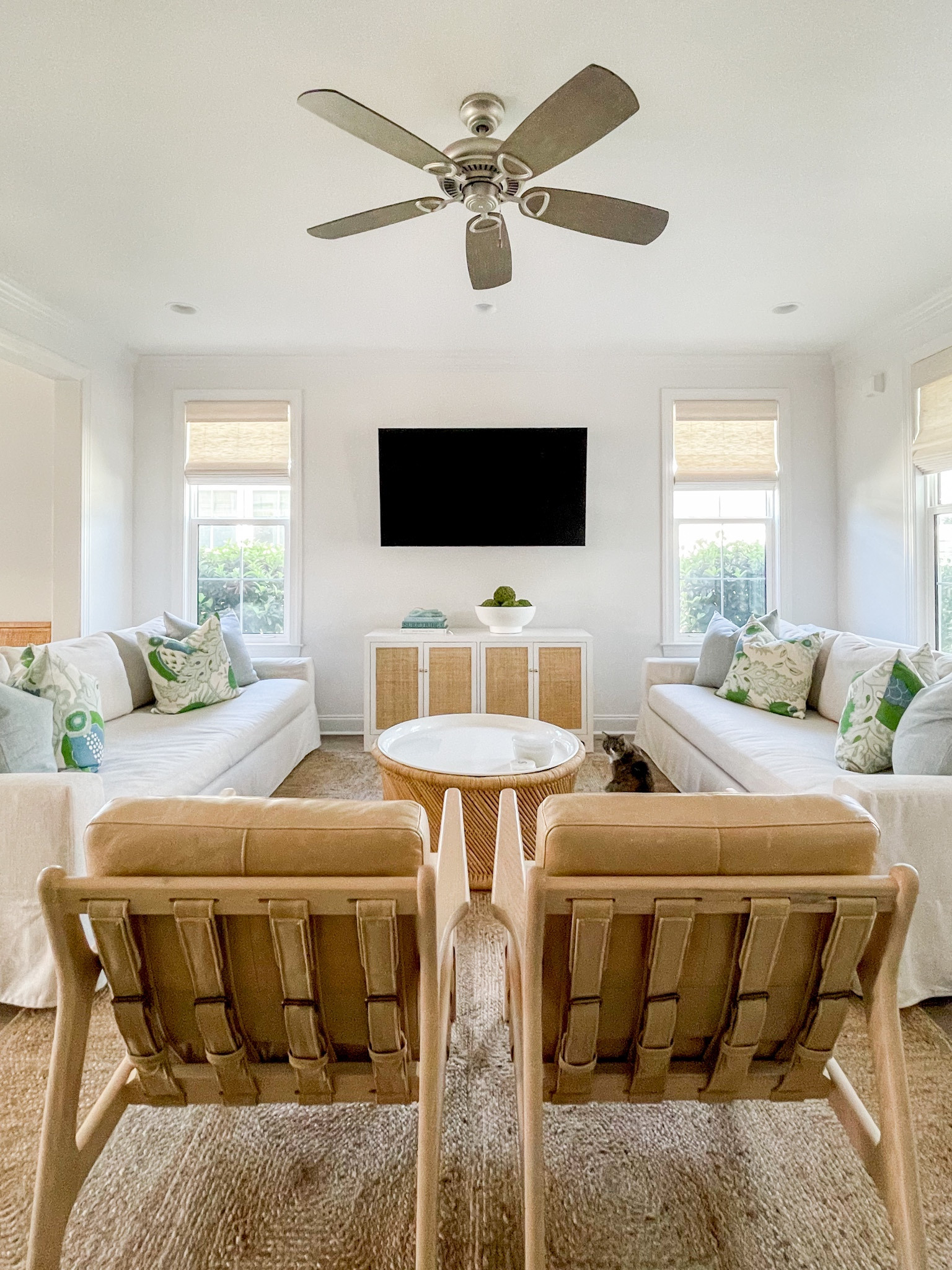 Our Florida coastal cottage living room including linen sofas, light leather chairs, rattan cabinet, jute rug, round bamboo storage coffee table, and blue and green throw pillows. .

#ltkhome #ltksalealert #ltkunder50 #ltkunder100 #ltkstyletip #ltkseasonal #LTKunder100 #LTKhome #LTKsalealert

#LTKhome #LTKSeasonal #LTKsalealert