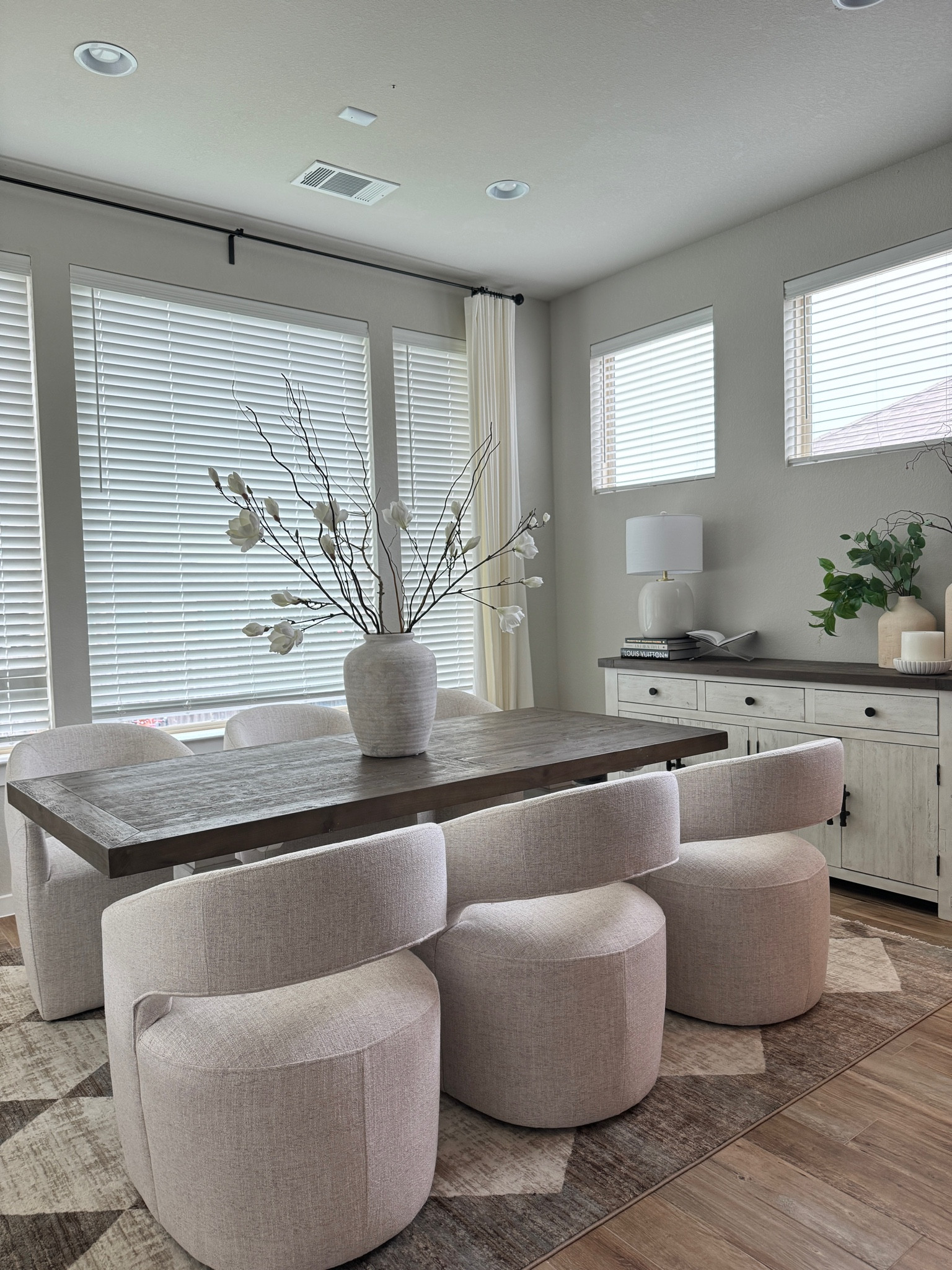 Table and sideboard are from living spaces, vase and picks are from Hobby lobby. Chairs are in the color ivory 

Amazon home finds, dining room chairs, dining room decor, modern dining room, swivel chairs, Amazon chairs 

#LTKHome #LTKSaleAlert #LTKStyleTip