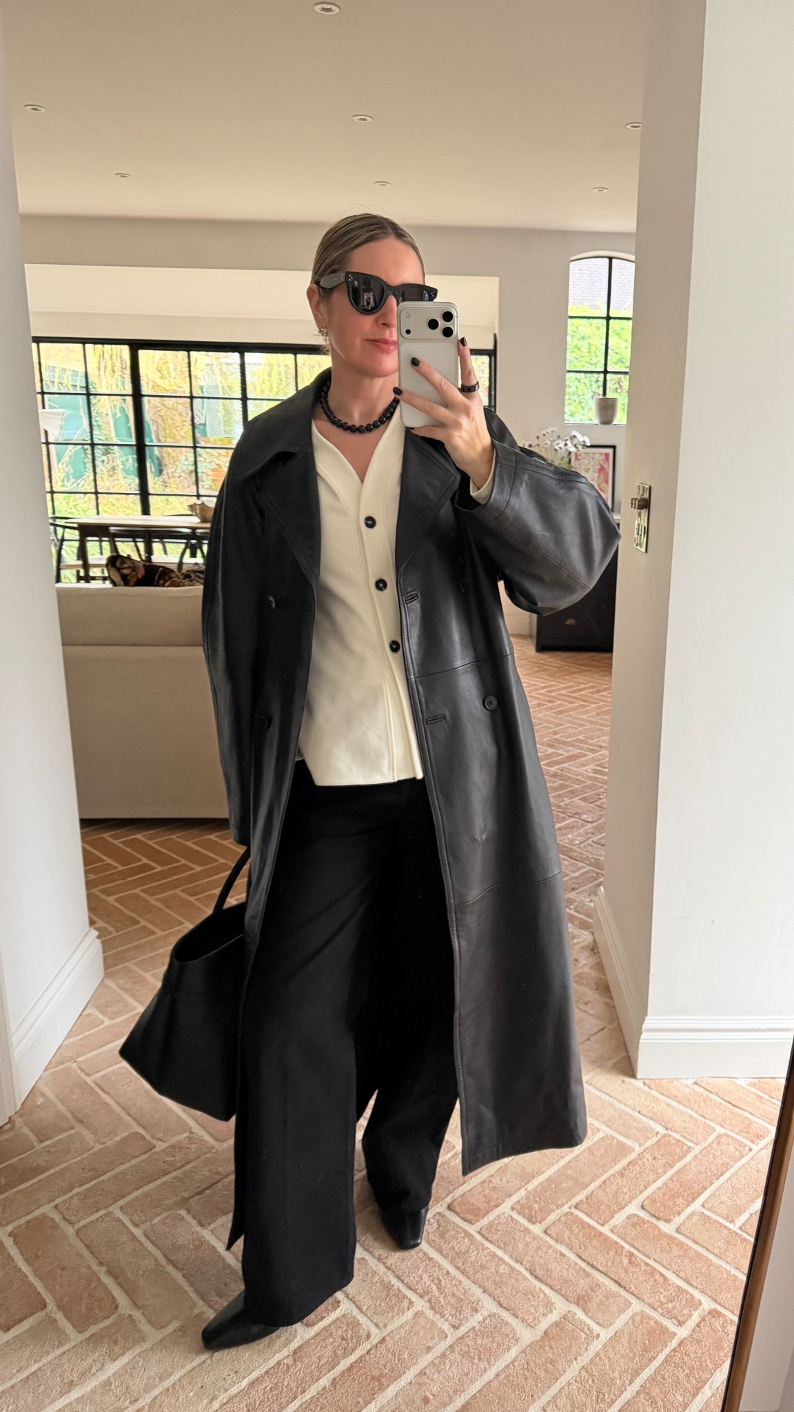 Today’s outfit for lunch | leather trench coat | Aligne top | Baggy Ayla Jeans | Boots | 

#LTKspring #LTKdatenight #LTKuk