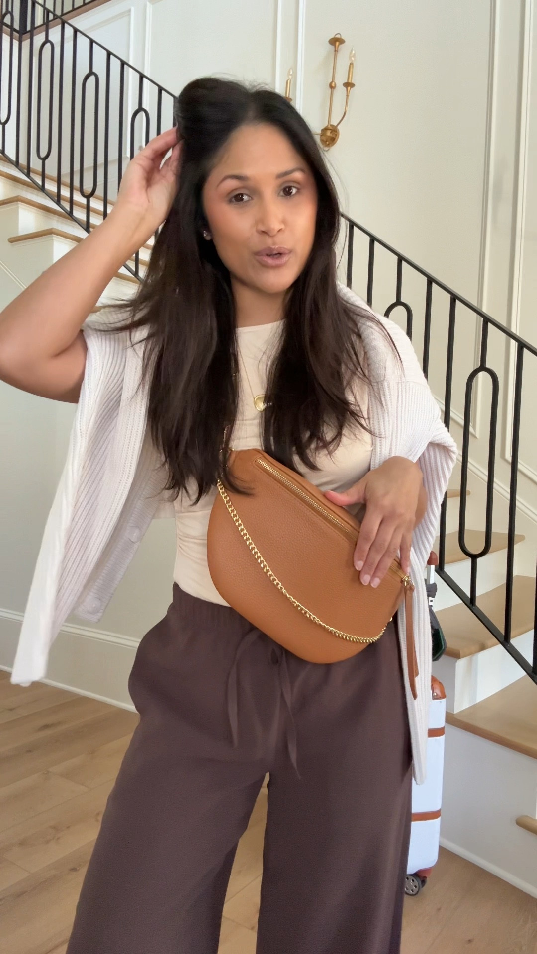 Linking my travel outfit here because you know how much I love these crepette pants from @Aritzia  that are wrinkle resistant. I own them in 3 colors and am considering more! Also, take 20% OFF my Beck sling bag with code: HAUTE20
#giginewyork #slingbag

#LTKPetite #LTKTravel