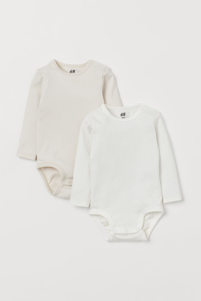 Long-sleeved bodysuits in soft jersey made from organic cotton. Snap fasteners on one shoulder an... | H&M (US + CA)
