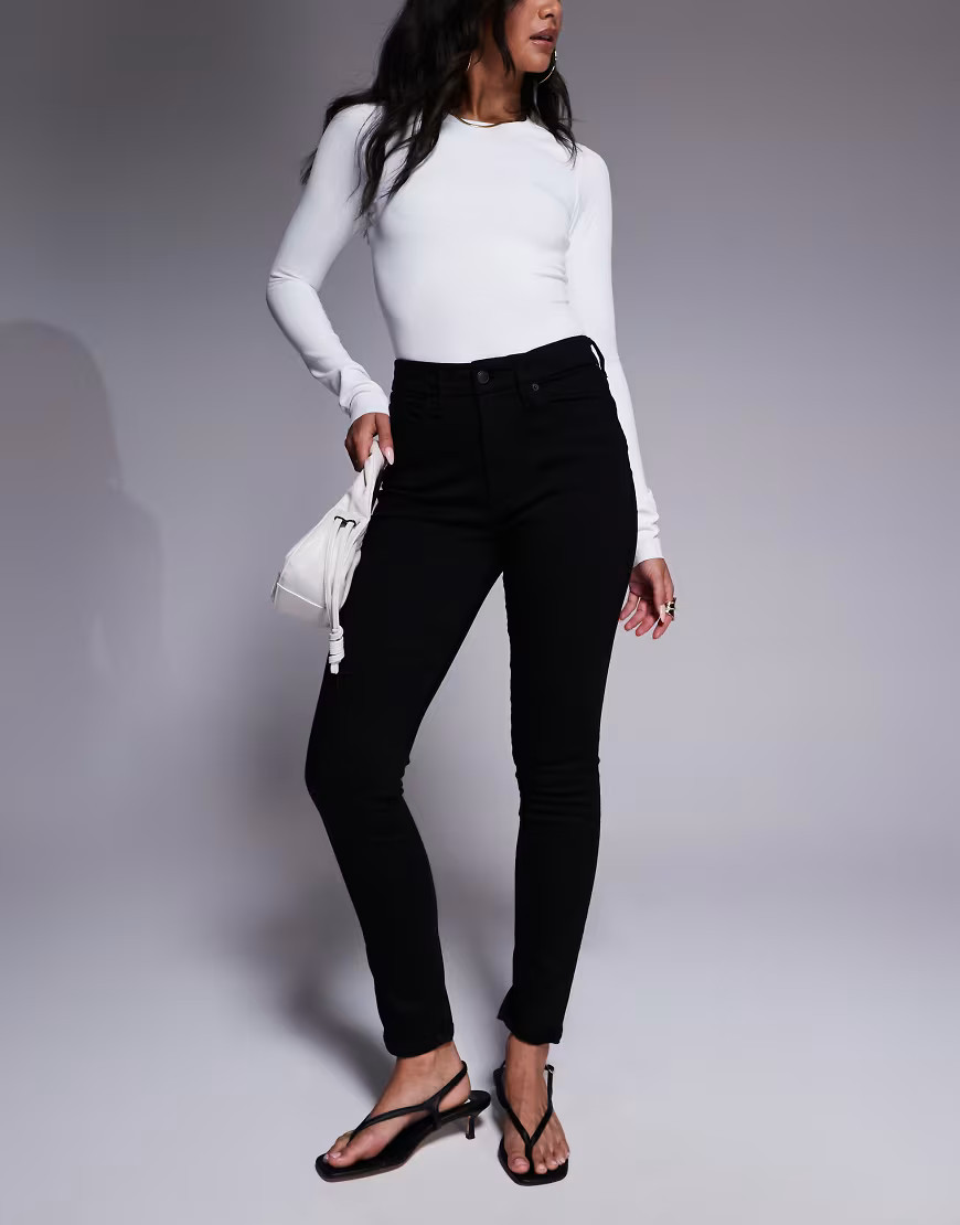 Good American good legs skinny jeans in black | ASOS (Global)