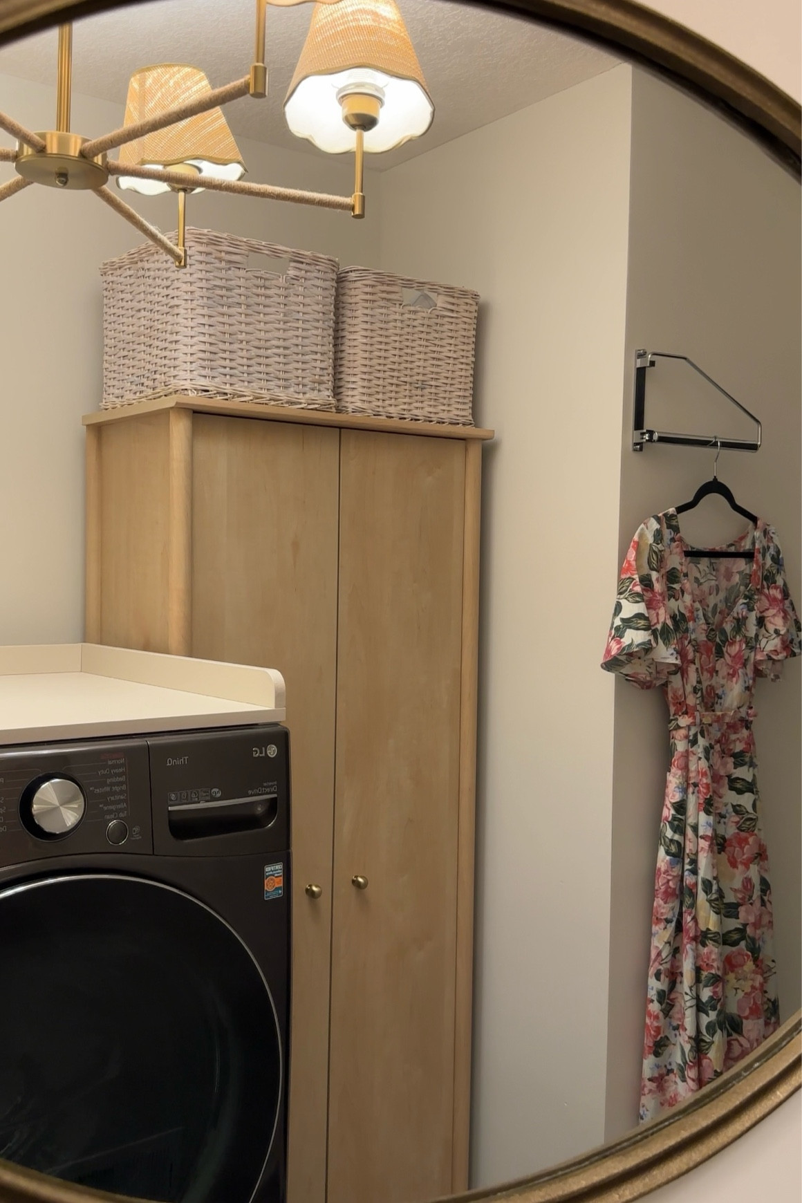 Laundry room cabinet - perfect for more storage without the full reno. I replaced the knobs and added baskets for a more modern traditional look and function! #laundryroom #organizewithme

#LTKHome #LTKmomlife
