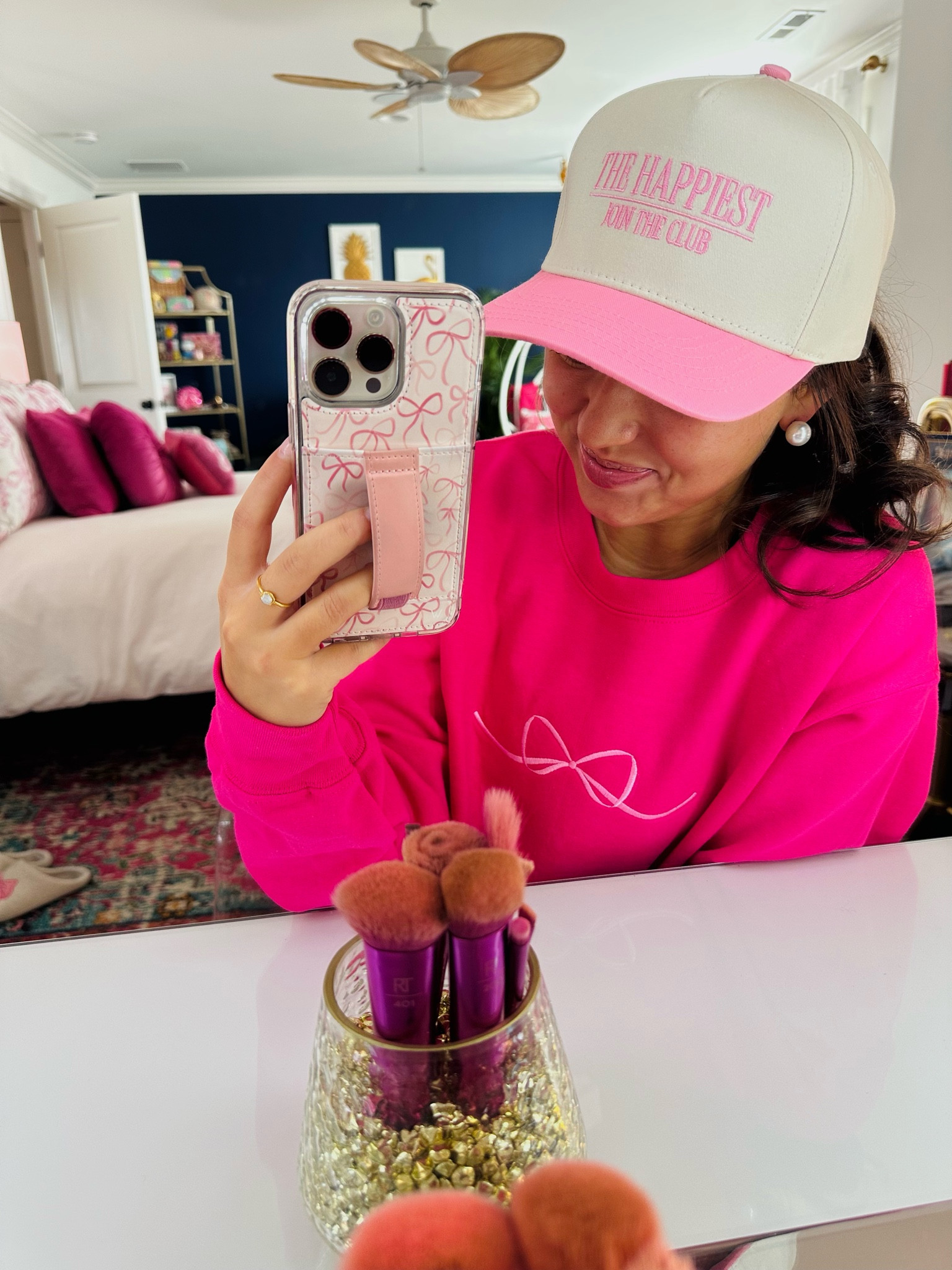 Buckle has the BEST trucker hats - I’m loving this new cute one! ☻ 

My sweatshirt is from @lizmareeboutique  on Insta 🎀✨ 

Trucker hats. Happy Club. Sweatshirts. Bows. Buckle. Hats. Phone case. Pink. Winter outfit. 

#LTKStyleTip #LTKFindsUnder50