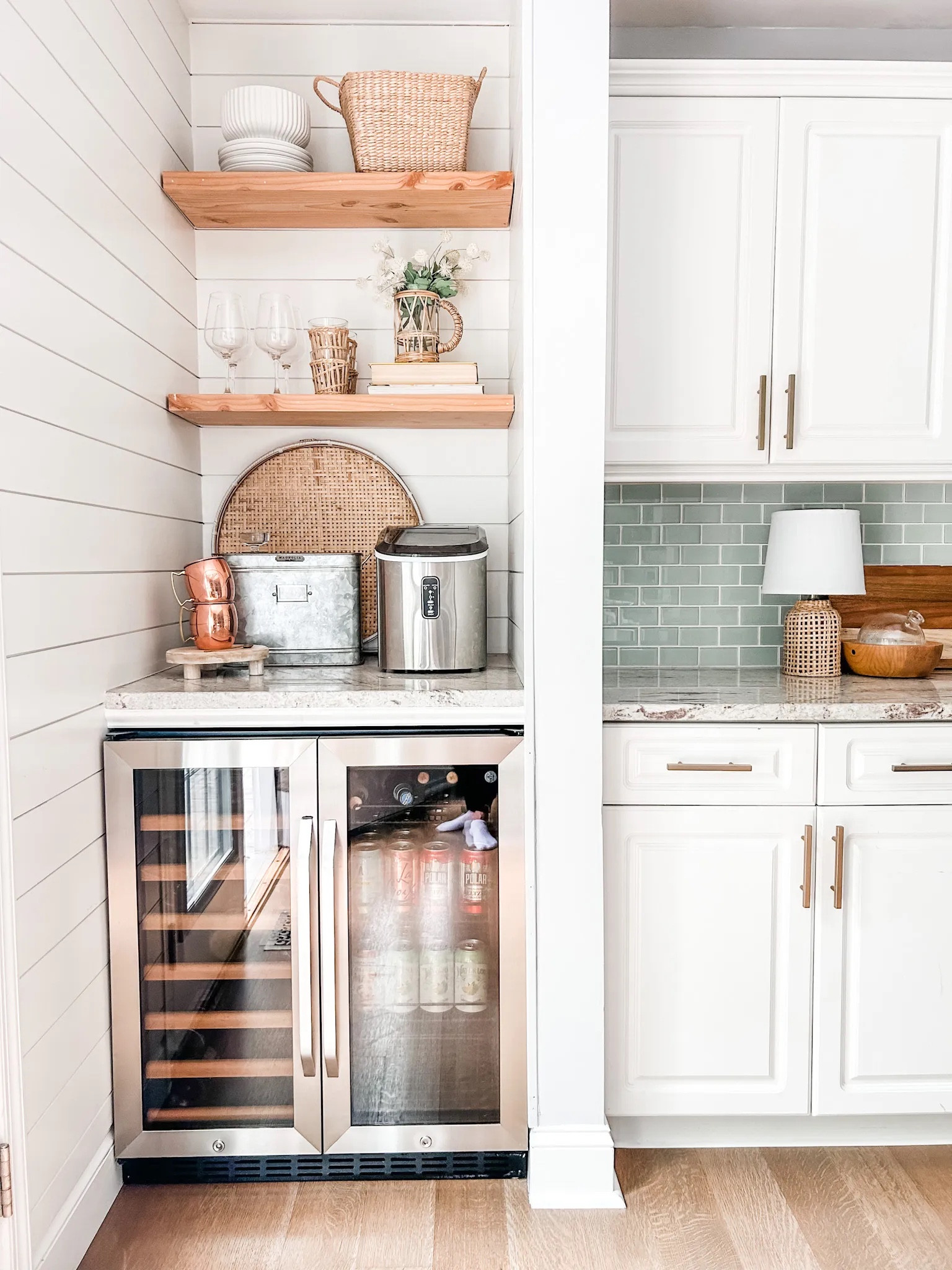 Love our wine and beverage refrigerator from Amazon!

Wine fridge, beverage station, copper Moscow mule mugs, countertop ice machine, ice maker, woven fruit basket, flat wicker basket, wine glasses, mini lamp, rattan glass pitcher, wicker wrapped pitcher, white fluted ceramic planter pot, light blue glass subway tile, gold hardware, gold handle, cabinet hardware, cutting board, wicker wrapped glass drink ware, rattan drinking glasses.

#kitchen 

#LTKFind #LTKstyletip #LTKhome