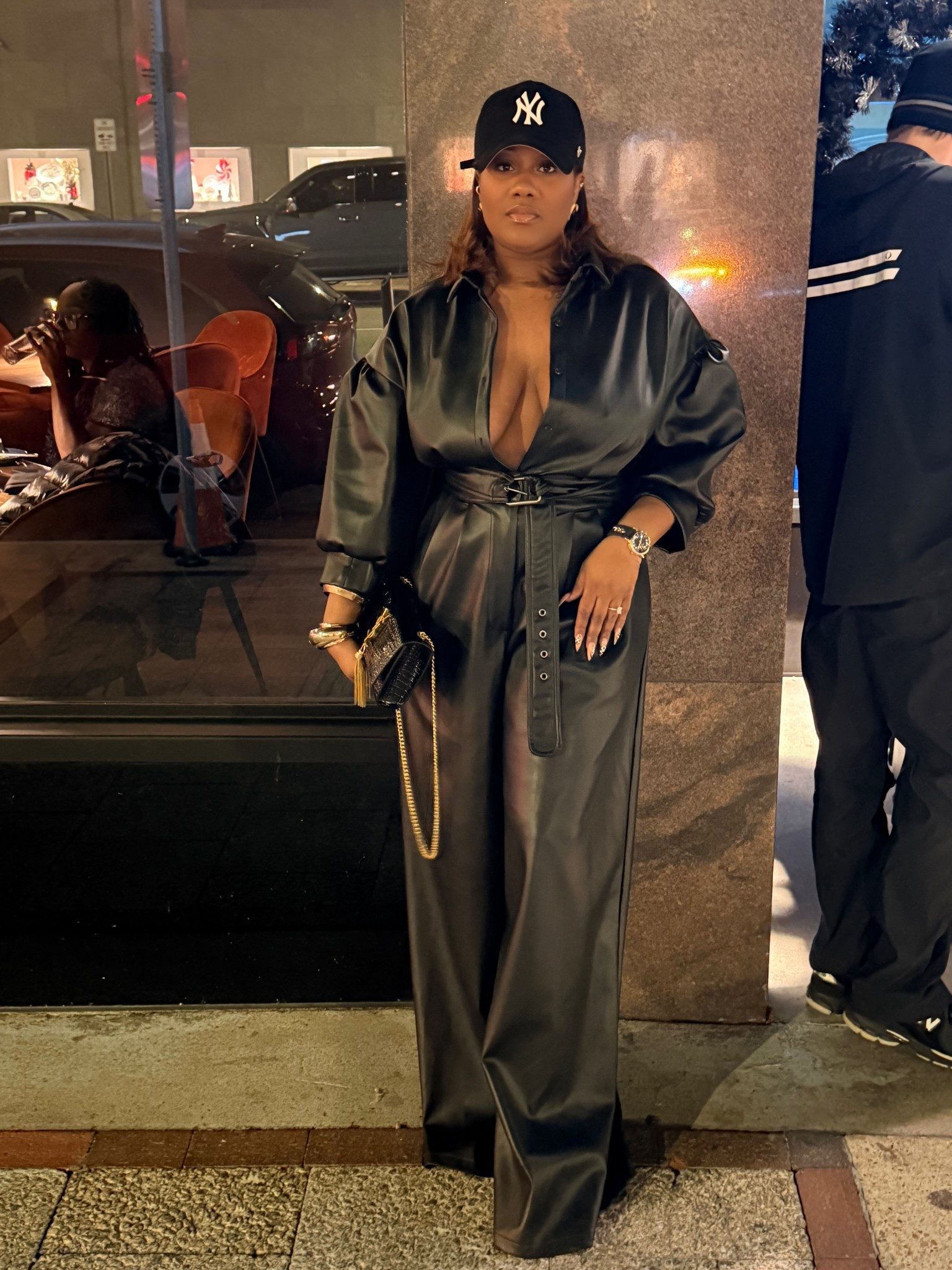 All-black everything for a city night out 🖤 Faux leather jumpsuit, statement belt, and gold details. #LTKseasonal #LTKnightout #StatementOutfit #WideLegJumpsuit 

#LTKBeauty #LTKootd #LTKmomlife