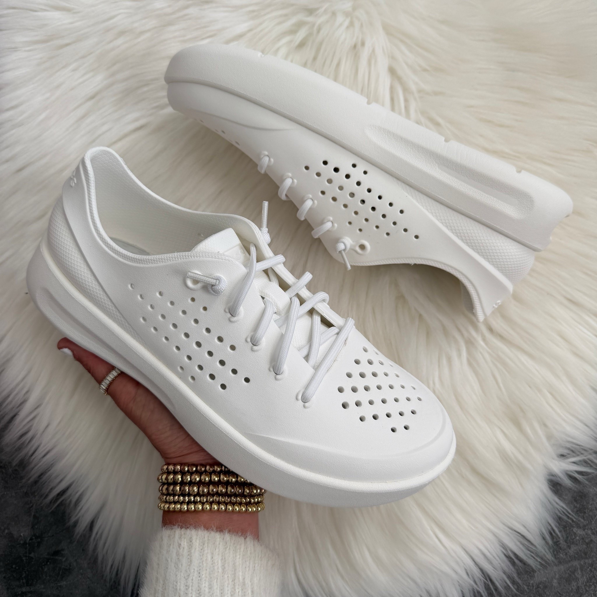 Crocs waterproof sneakers. Great for the beach or pool