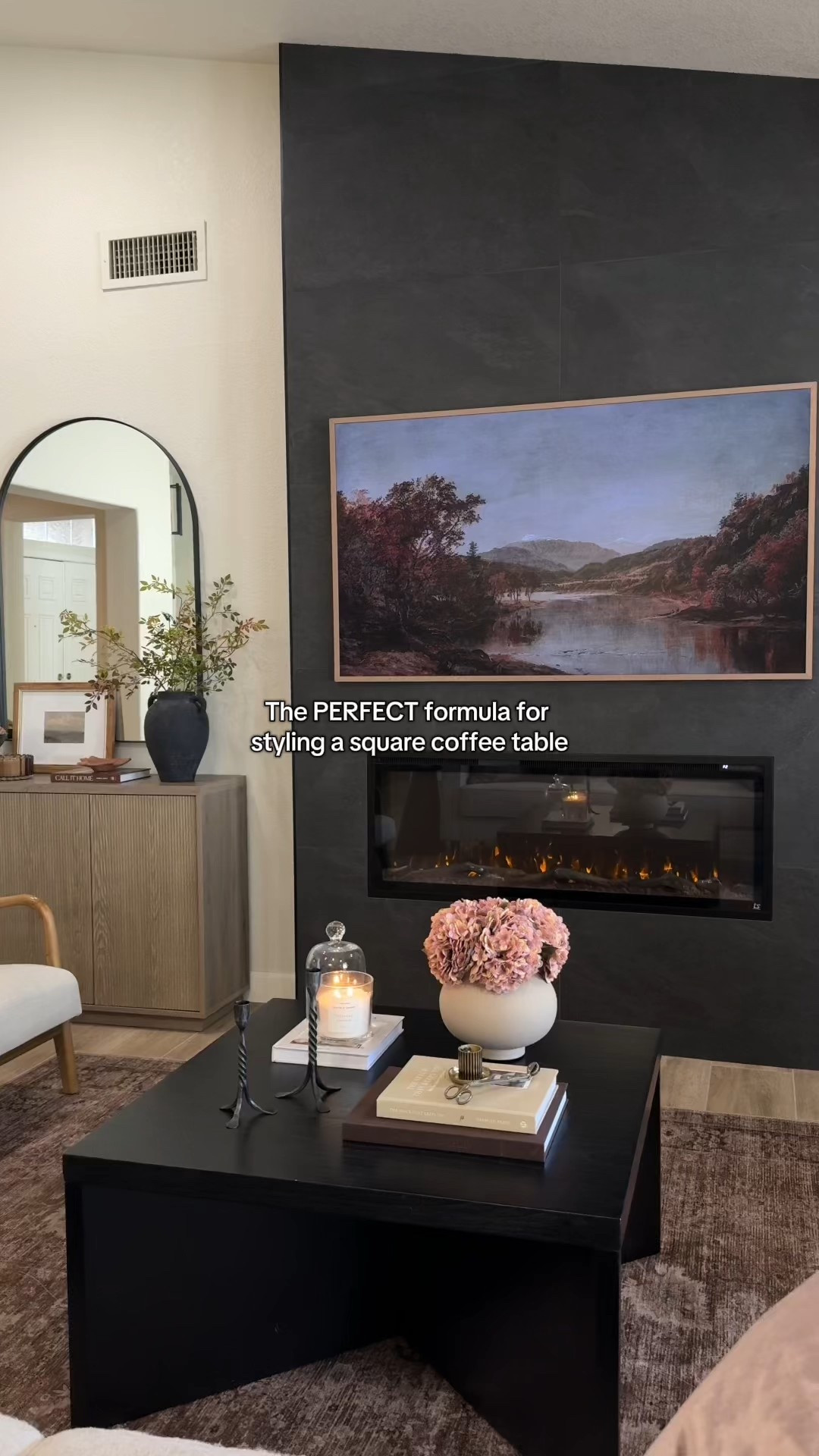 Styling a square coffee table? Here’s my go-to formula 🤎 I break the table into quadrants, layer in coffee table books for height, add a vase with florals for color + interest, and mix in candles and decorative accents for balance. Simple, cozy, and elevated.
Everything I used to style this table is linked here so you can recreate the look!
#coffeetablestyling #coffeetabledecor #modernorganic #neutraldecor #homestyling #livingroomdecor 

#LTKHome #LTKStyleTip #LTKSeasonal