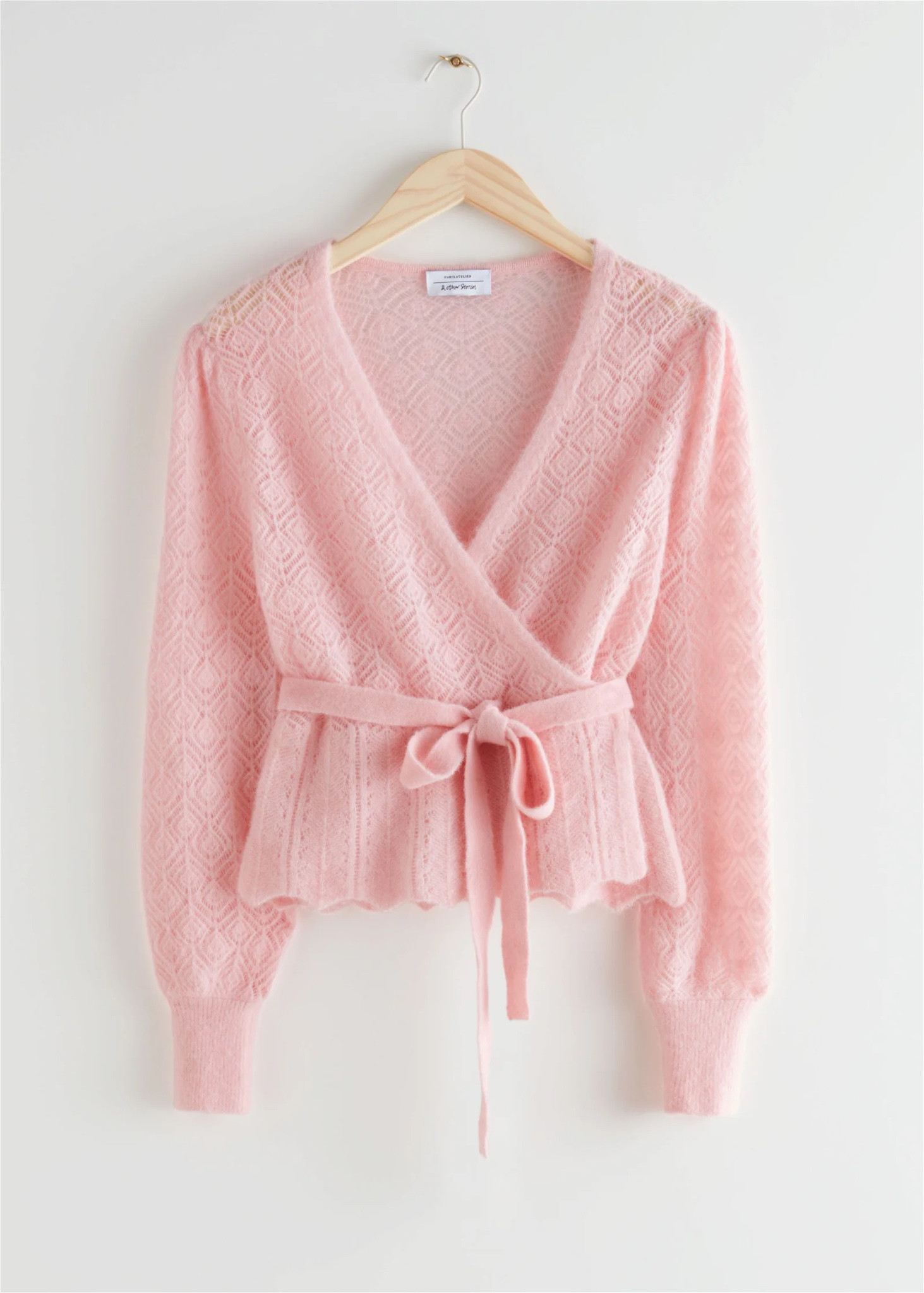 this pink wrap cardigan from my wardrobe is unfortunately no longer sold! It’s from &otherstories 🎀

“Pink wrap pointelle cardigan”

I have linked some simular options but don’t forget to check vinted and depop which is where i bought mine🤍