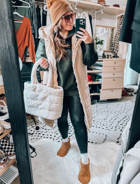 Winter casual midsize outfit 
Spanx faux leather leggings sized up to a 1x 
Amazon cozy sweater I own in multiple colors 
Long puffer vest xl 
Sherpa bag target 
Ugg low look for less boots wearing a size 9 
Amazon lettuce edge socks 
Amazon beanie 
Amazon sunglasses 


#LTKSeasonal #LTKCyberweek #LTKcurves