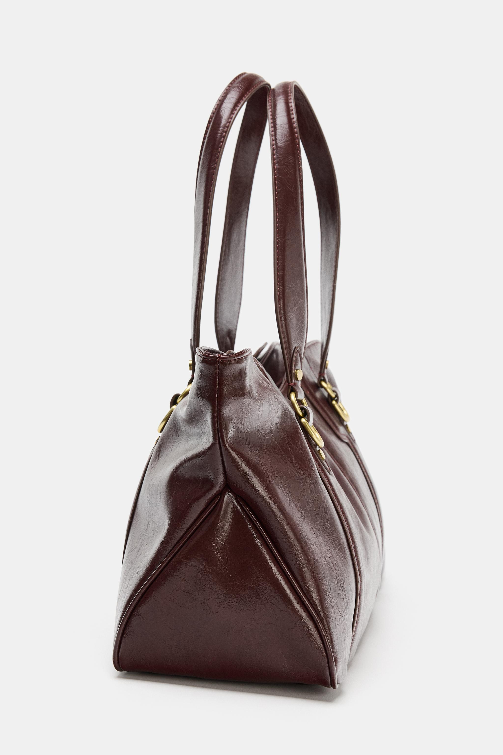 METAL DETAIL SHOULDER BAG$ 75.90Burgundy Red | 6045/610/624Add to cartAddBag with metal details. ... | Zara US