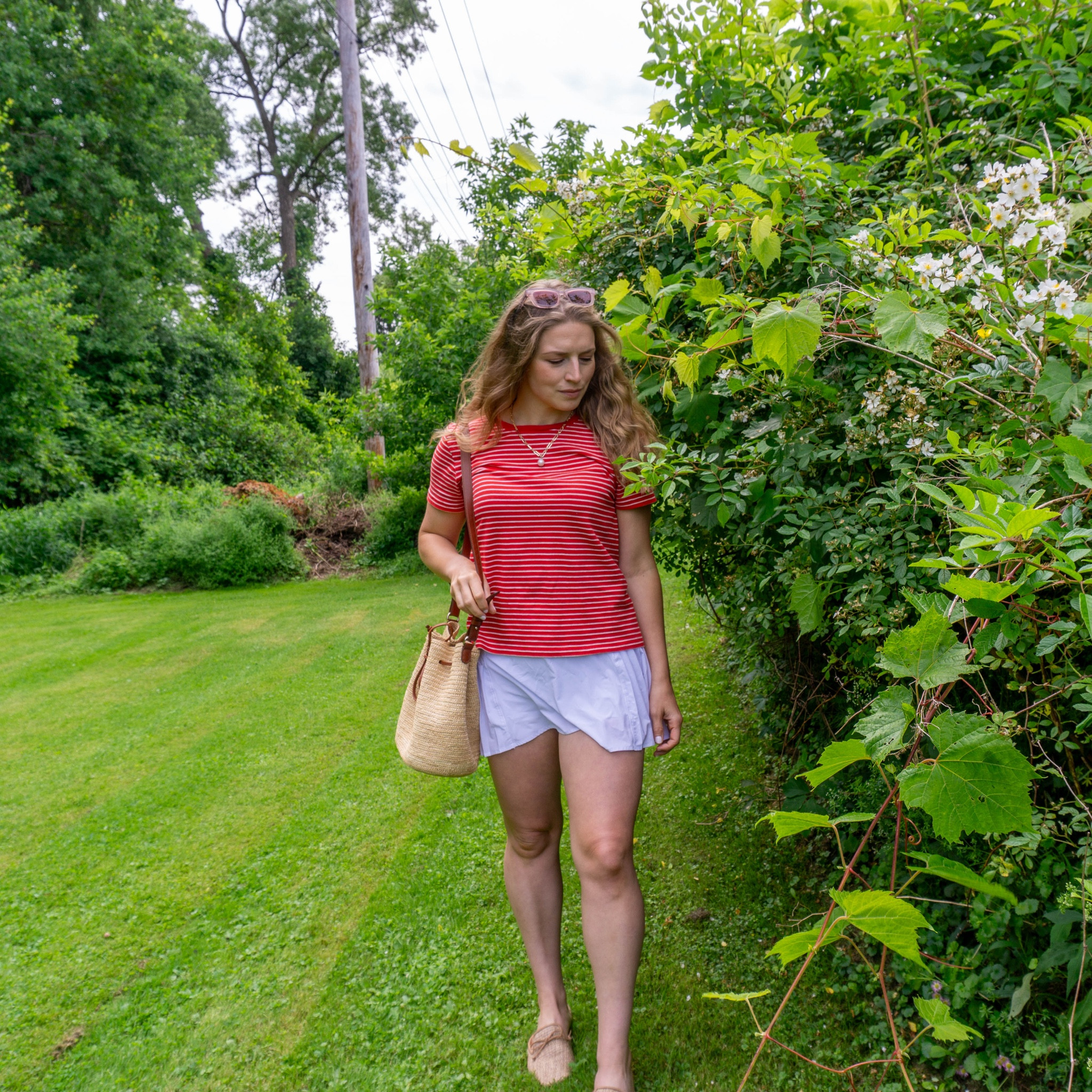 French girl fashion, ootd, striped tee, red tee, tennis skirt, straw bag, basket bag 

#LTKItBag #LTKFindsUnder100