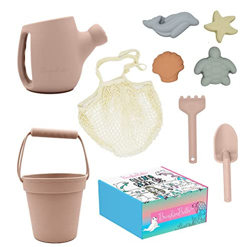 BrushinBella Silicone Beach Toys - Beach Bucket Set with Shovel, 4 Sand Molds - Travel-Friendly Kids Sand Toys in Net Carrying Bag - Safe Baby Sand Toys - Dishwasher-Safe (Blush Pink) | Amazon (US)