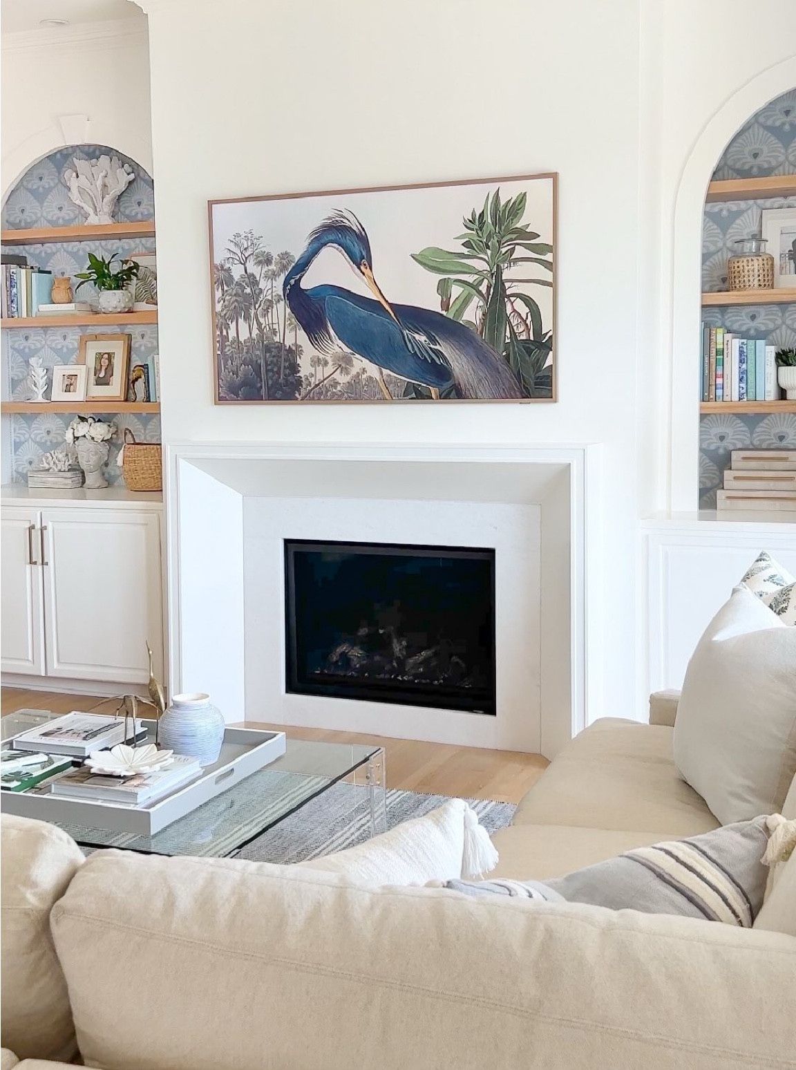 Hanging a TV above the fireplace... what’s your opinion on it? 🤔 Mine is an unpopular one 🙈... we love it and never feel like we’re craning our necks to watch it. 

That’s in large part because we lowered our mantel height a whopping 21-inches during our fireplace remodel. 🙌🏻 And since we hung a Frame TV that looks like art when the TV’s off, I don’t feel like we’re making a design sacrifice either. I’d love to hear your opinion too!

#LTKFindsUnder100 #LTKFindsUnder50 #LTKHome