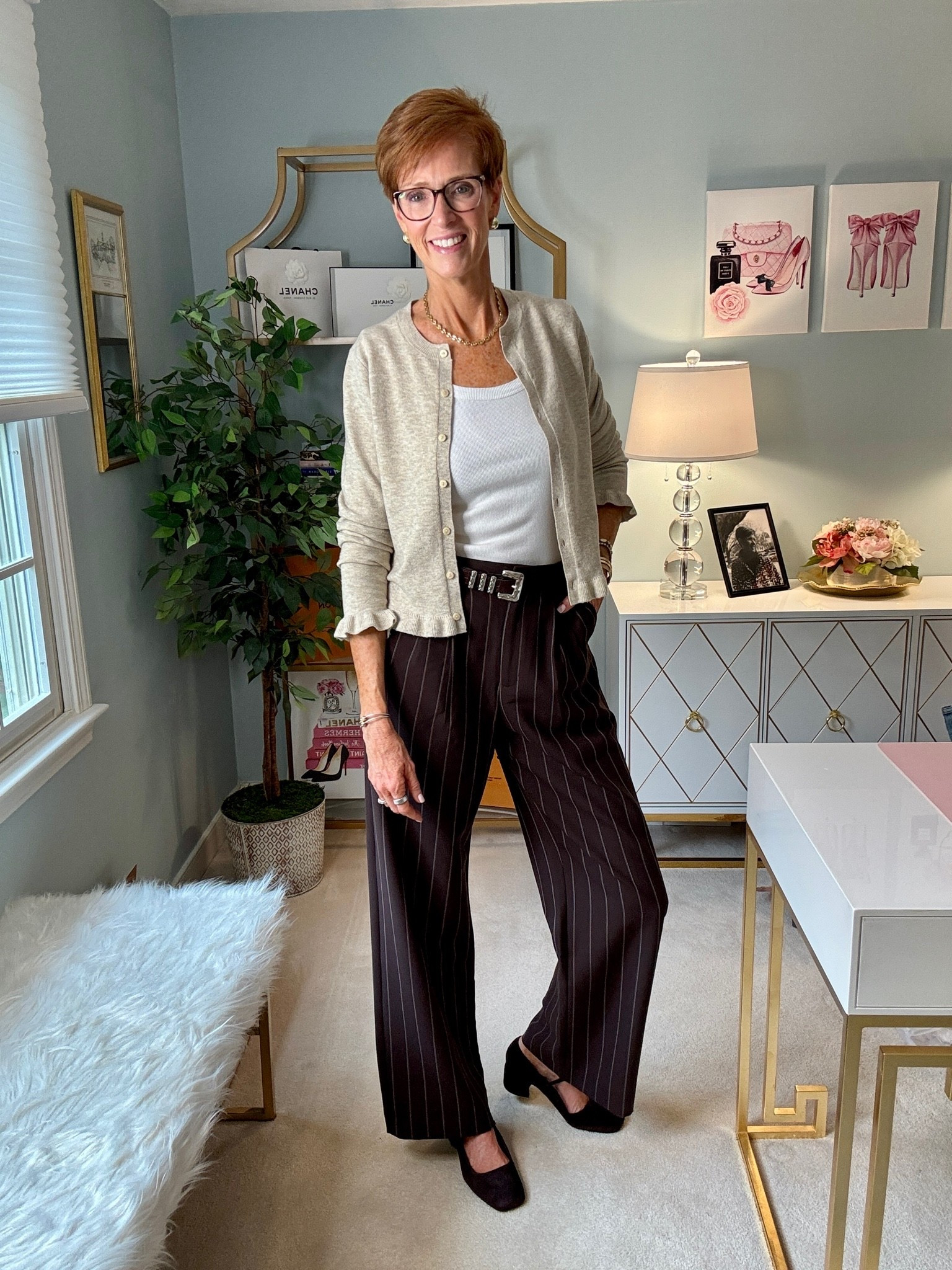 Pinterest gave me the idea. My closet made it wearable.

Pinterest Inspired Outfit #31 might be one of the easiest fall outfit formulas I’ve recreated yet: brown pinstripe trousers, a cream ribbed tank, a light beige cardigan and brown suede woven flats.

And this is exactly why I think a great pair of fall trousers earns its place in your closet. They can look polished without feeling overly dressed, and keeping everything else soft and neutral makes them incredibly easy to wear for everyday life.

This week is all about fall trousers, and I’m showing you how to make them work beyond the office — because good trousers should earn more than one kind of outfit.

SAVE this one for the next morning you’re staring at your closet wondering what to wear, and SEND it to a friend who loves an easy neutral fall outfit.

Would you wear this one? And tell me: are you wearing trousers more often this fall?

#FallTrouserOutfits #PinterestInspiredOutfit #Over50Style #TallWomenStyle

#LTKootd #LTKOver40 #LTKTall