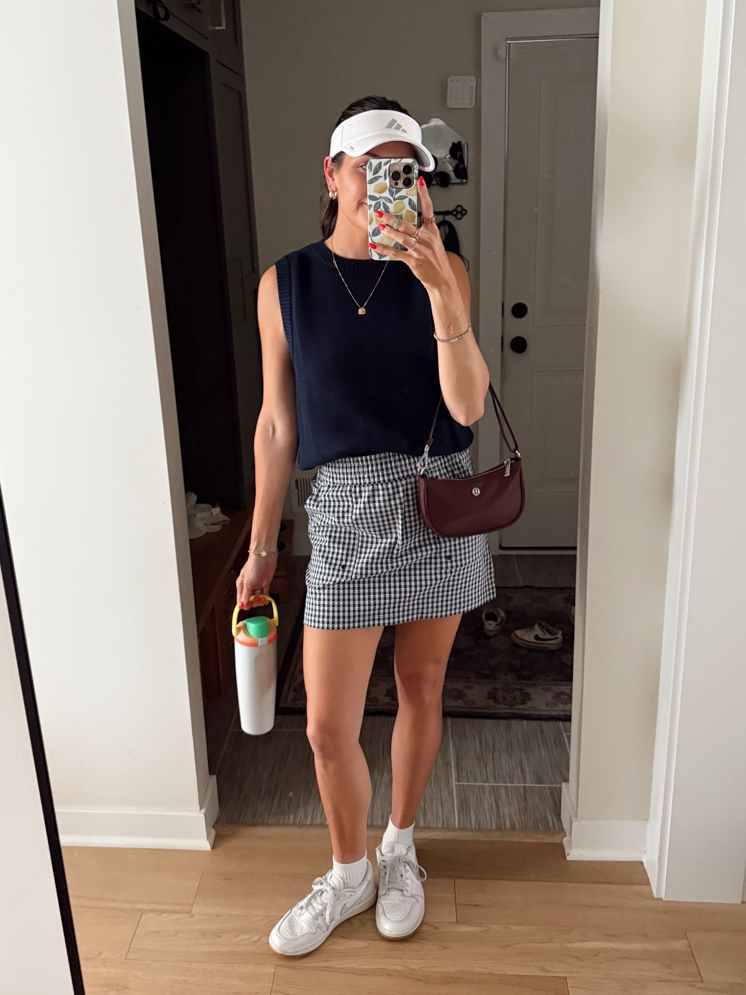 Tonight’s ladies league golf outfit ⛳️ 
Sweater vest: tts (S) wore this on a humid/hot day and it was still very breathable!
Gingham skort: tts (S) have this in 2 colors 😍
Golf sneakers: tts

#LTKActive #LTKSeasonal #LTKStyleTip
