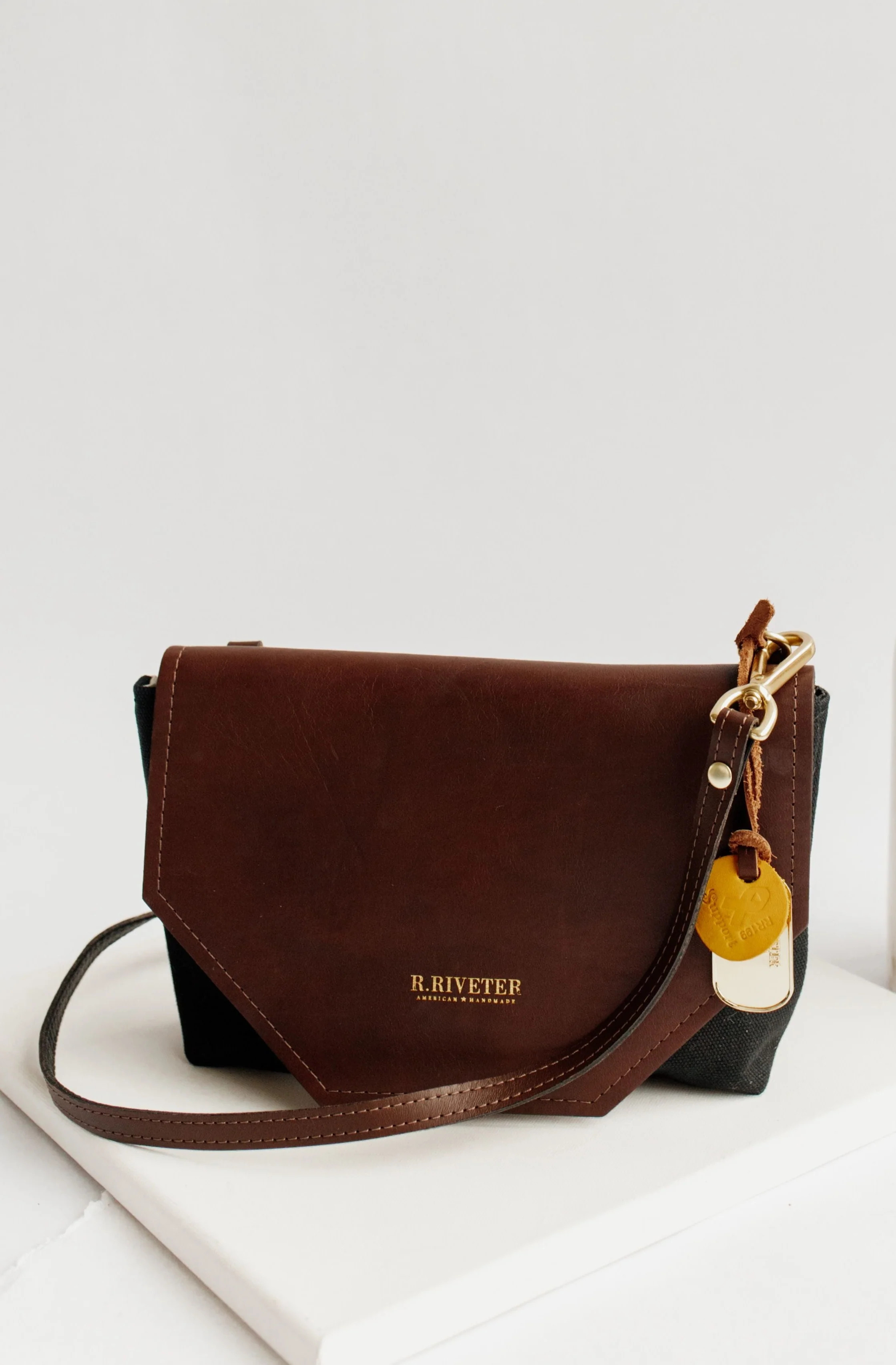 Patton | Signature Black Canvas + Brown Leather Crossbody Handbag | R. Riveter