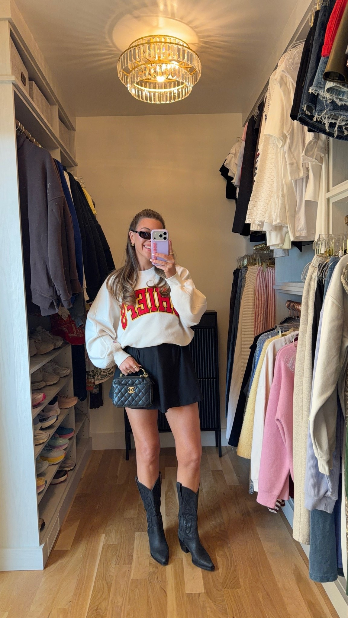 black abercrombie workout dress with built in bra and shorts styled with oversized white Chiefs graphic sweatshirt and black western boots fall outfit 🍂

I’m 5’4” and wearing my usual small
• nfl crewneck: medium

vivrelle code: emerson20
electric picks code: emerson20

workout dress, activewear, athleisure, exercise dress, black dress, fall looks, fall outfit, holiday outfit, game day outfit, skort outfits, athletic skorts, casual skort outfits, summer skort outfits, skort dress, everyday skort outfits

#LTKActive #LTKgrwm #LTKSeasonal
