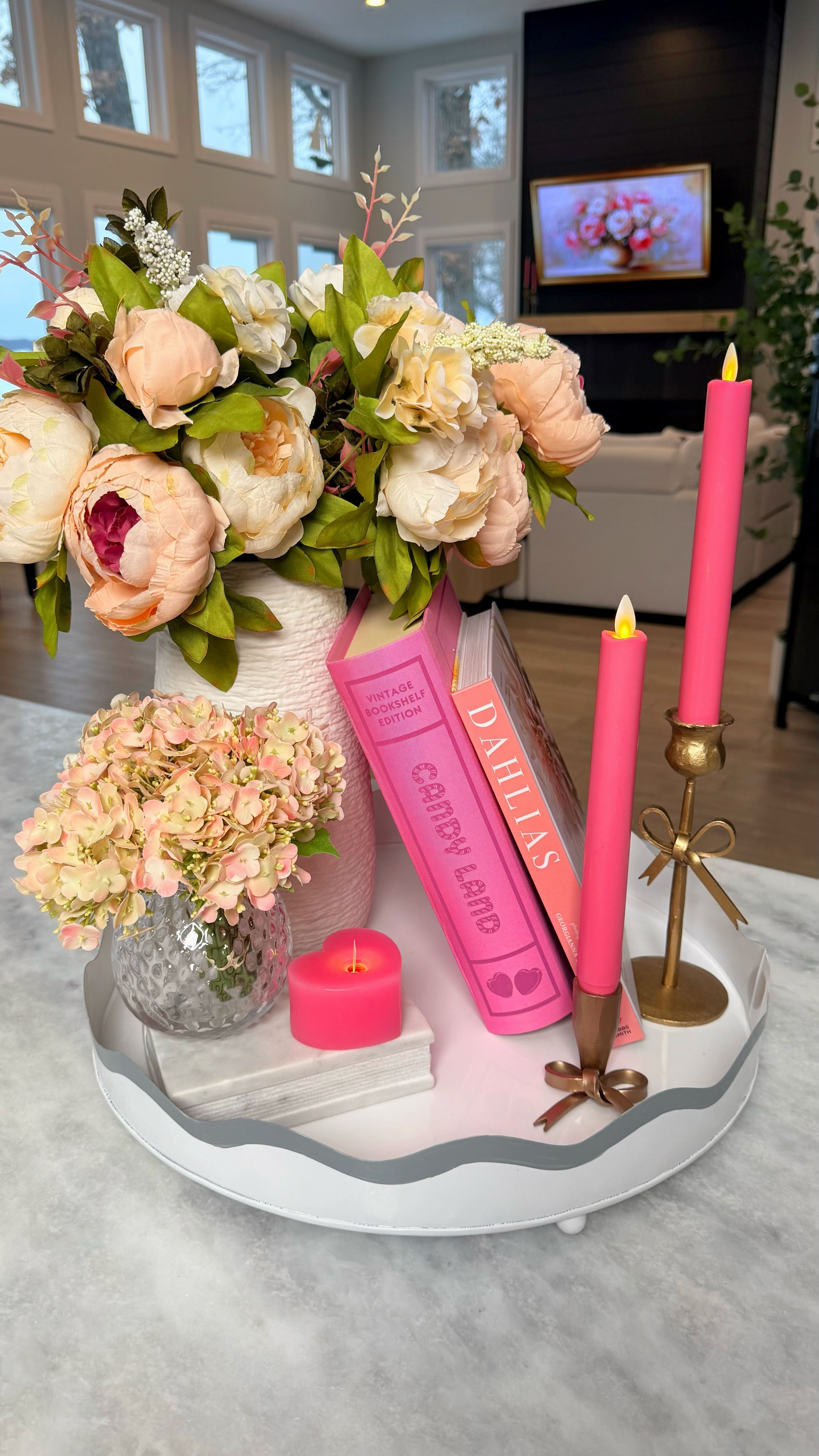 An easy Valentine’s Day centerpiece you can put together in minutes.
Soft florals, pink candles, and simple layers for a cozy, elevated look. Perfect for a coffee table, kitchen table, or kitchen island. And yes… the book is actually a Candy Land game hidden inside 

 #LTKValentine #LTKHome
